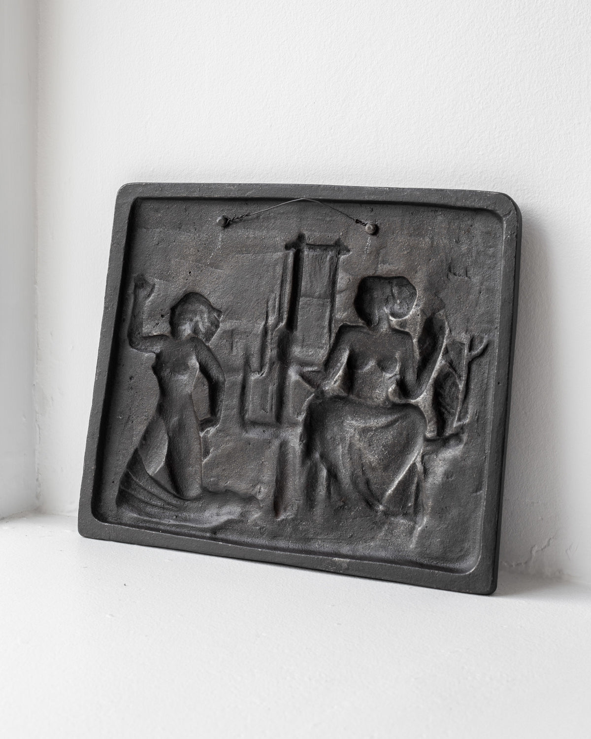 Cast iron wall relief sculpture depicting two figures by Ulla Fogelklou-Skogh
