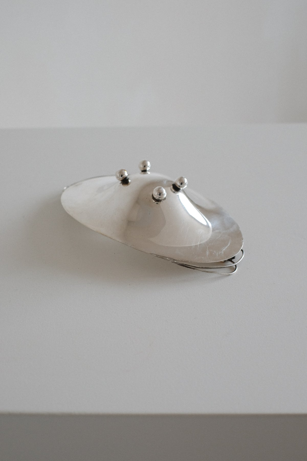 Small Silverplated Bowl — top view showing rounded shape on white surface