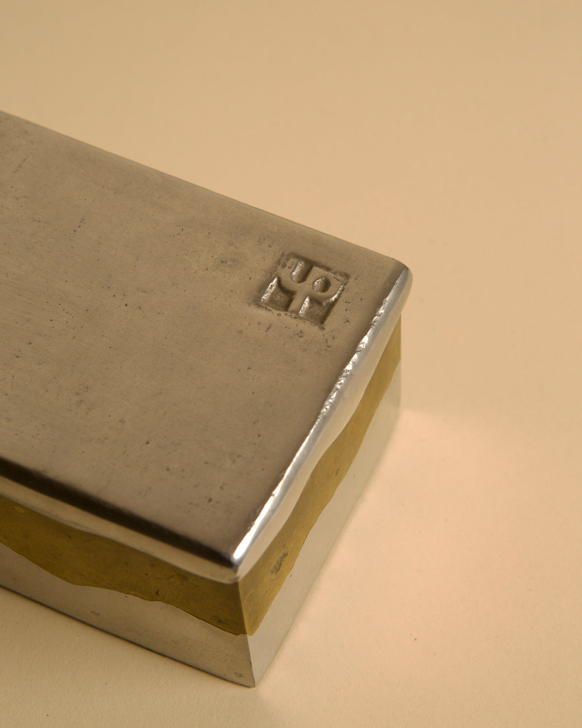 Brutalist metal and brass box by David Marshall, 1970s — side angle showing brushed metal finish