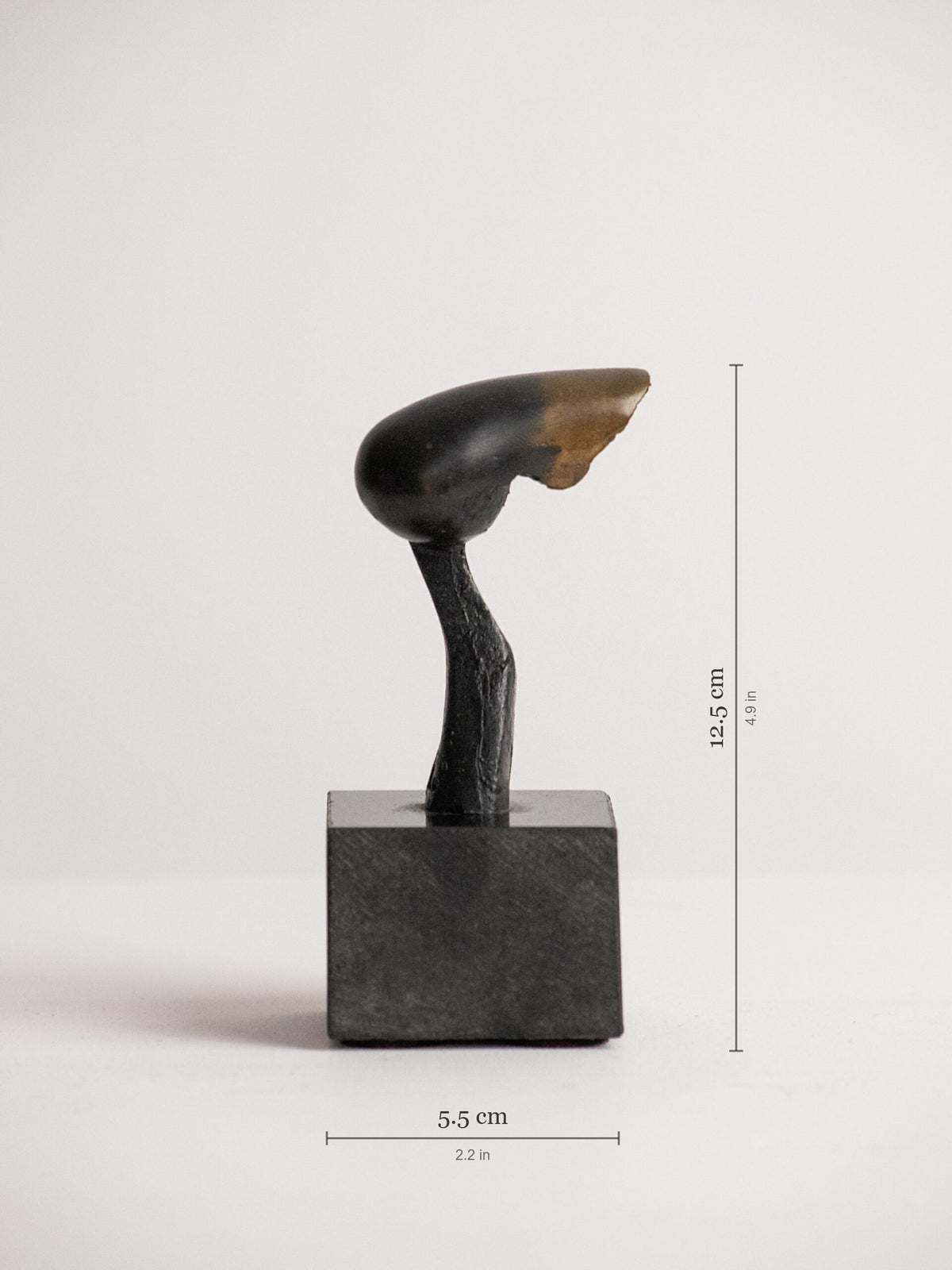 Biomorphic Sculpture in Patinated Metal on a Black Stone Cube, Scandinavian, Late 20th Century — detail view