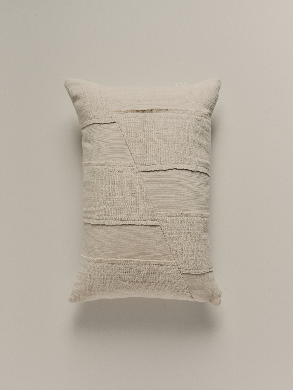 Handwoven white cushion in cotton and hemp  by Elle La | The Oblist