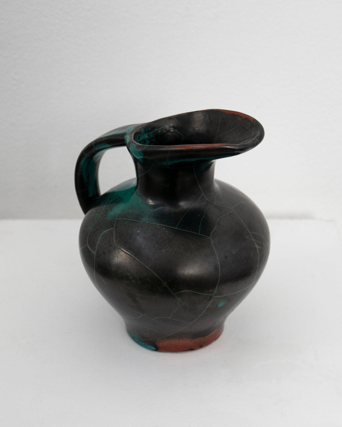 Dark ceramic jug with green patina by Richard Uhlemeyer 1950s