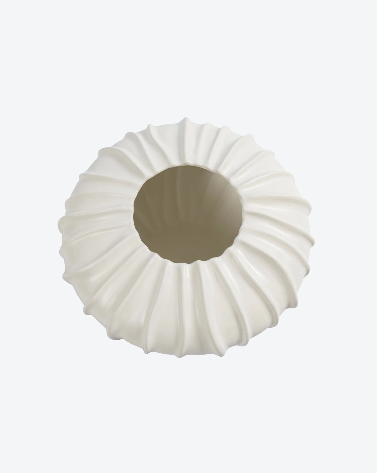 Introducing the Wide Cloak Vase from Ransom & Dunn's ceramic collection, this exquisite piece features a round shape with a ribbed, scalloped exterior. Expertly handmade in Portugal, its circular opening enhances the textured elegance of its plain white finish.