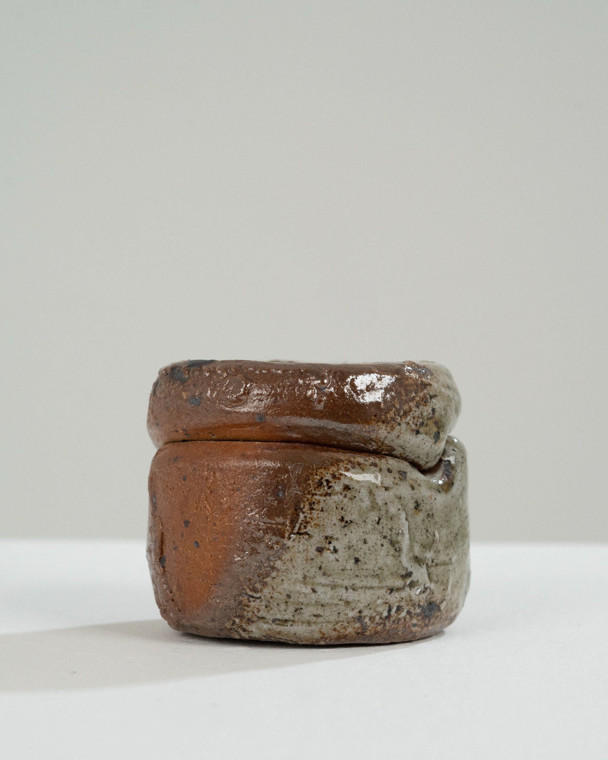 Handmade stoneware box with glazed brown and speckled finish