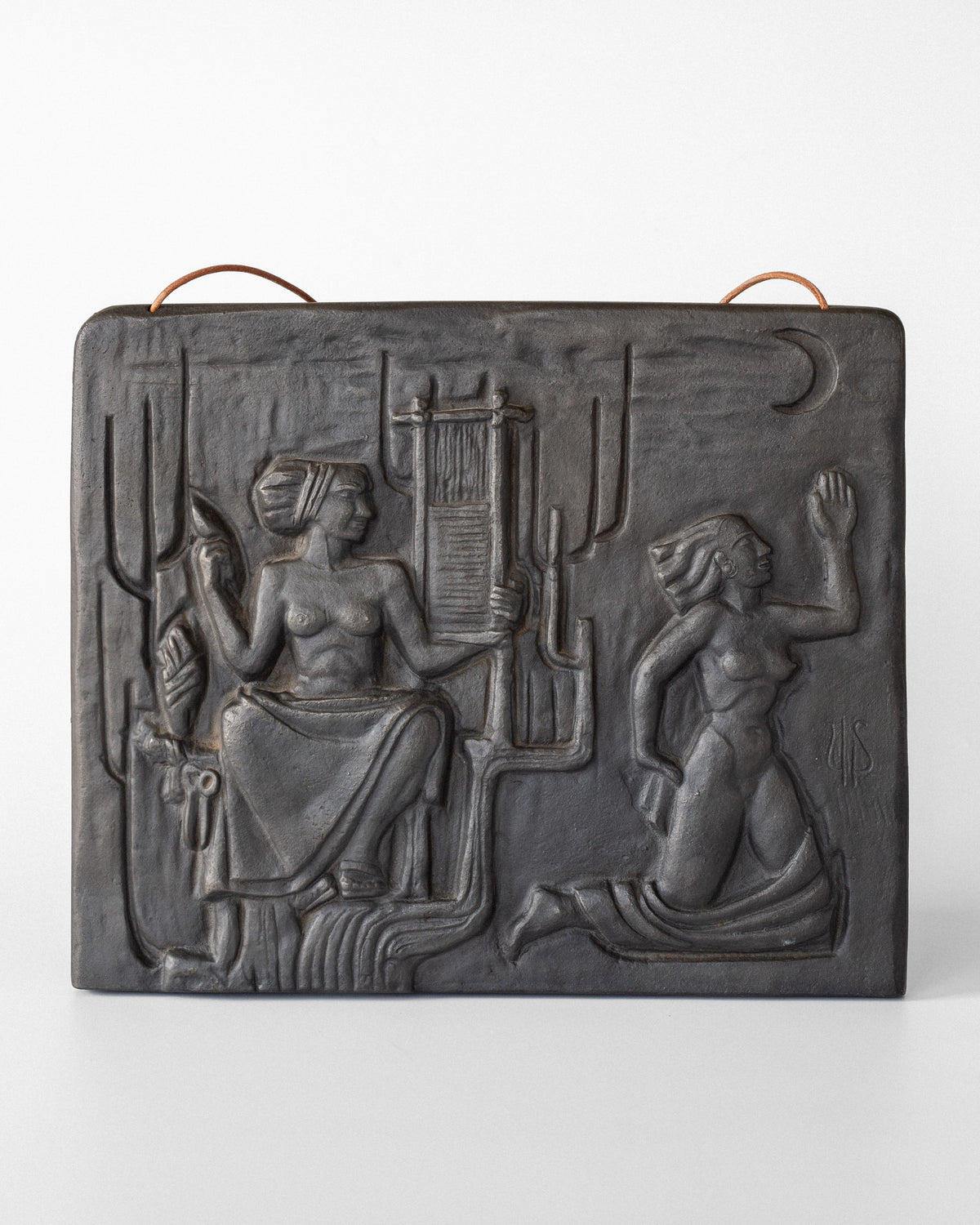 Egyptian-inspired cast iron wall relief depicting seated and kneeling figures, 1960s