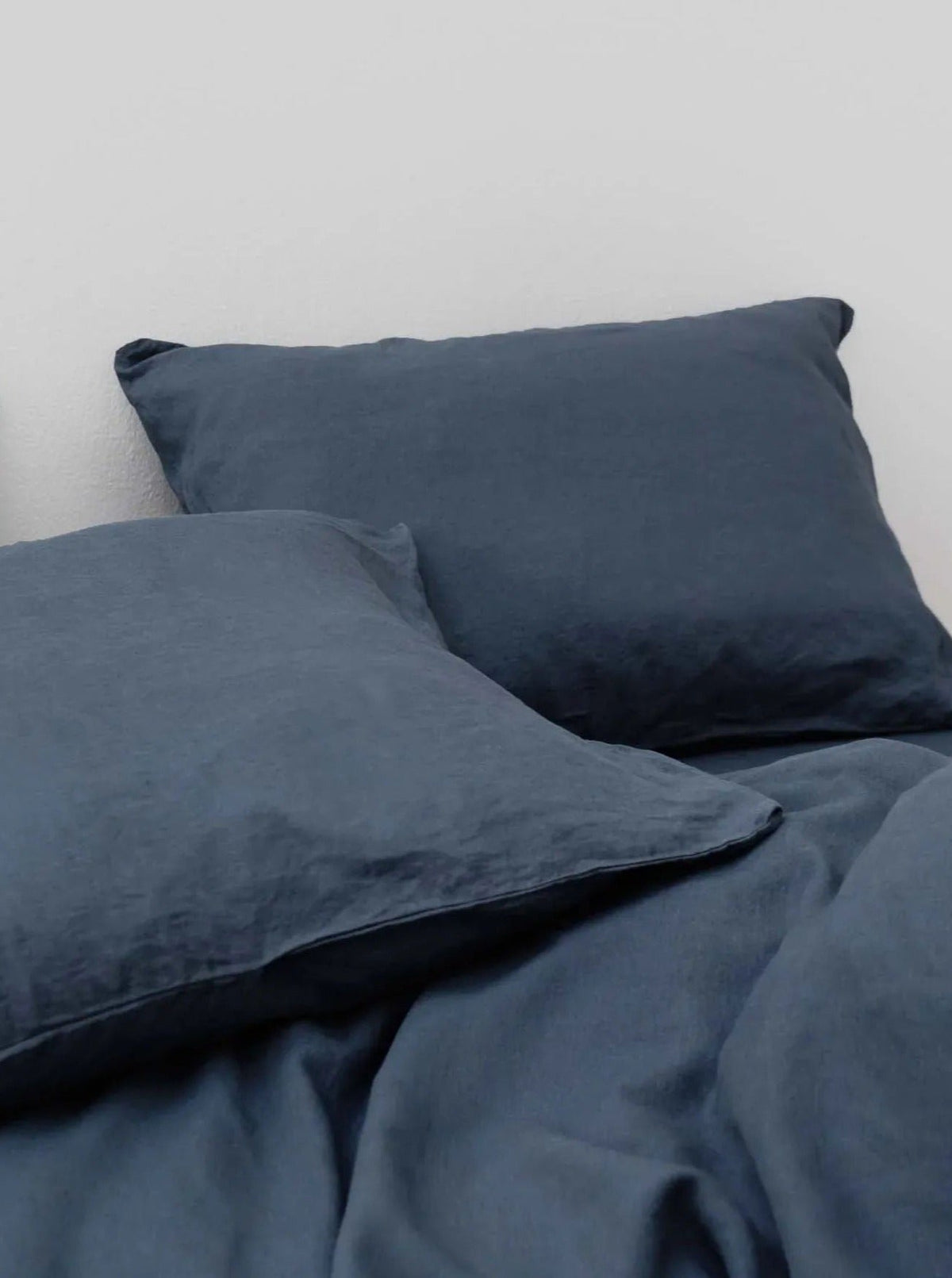 Washed Linen Bed Set Stormy Blue — close-up of textured linen pillows