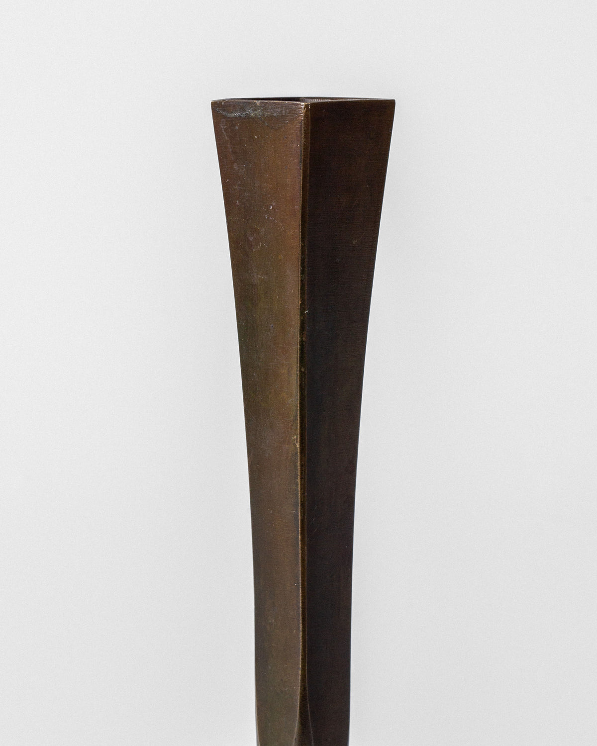 Bronze Art Deco vase detail showing geometric angular form