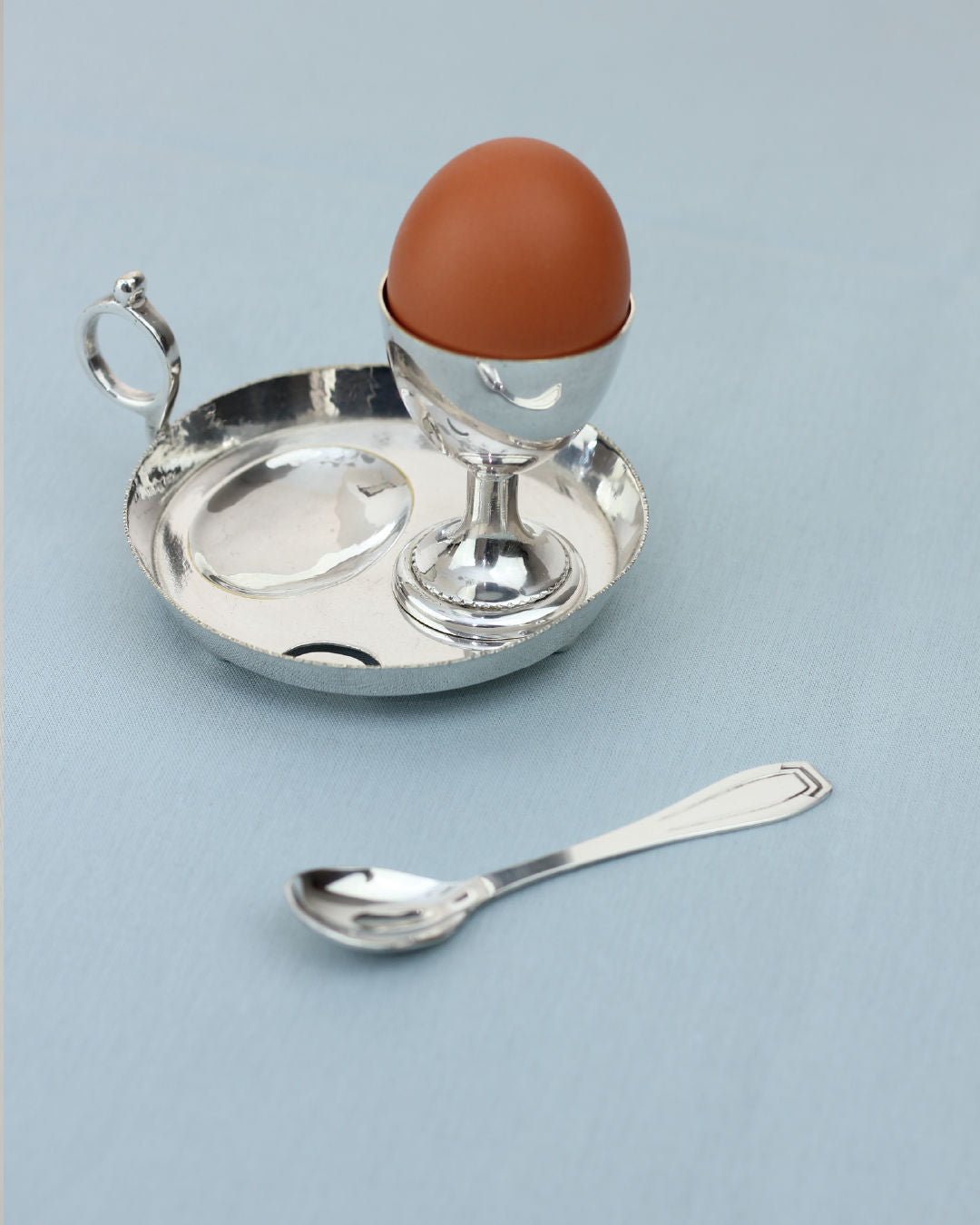 Silver-plated egg cup holder with tray, handle and spoon set