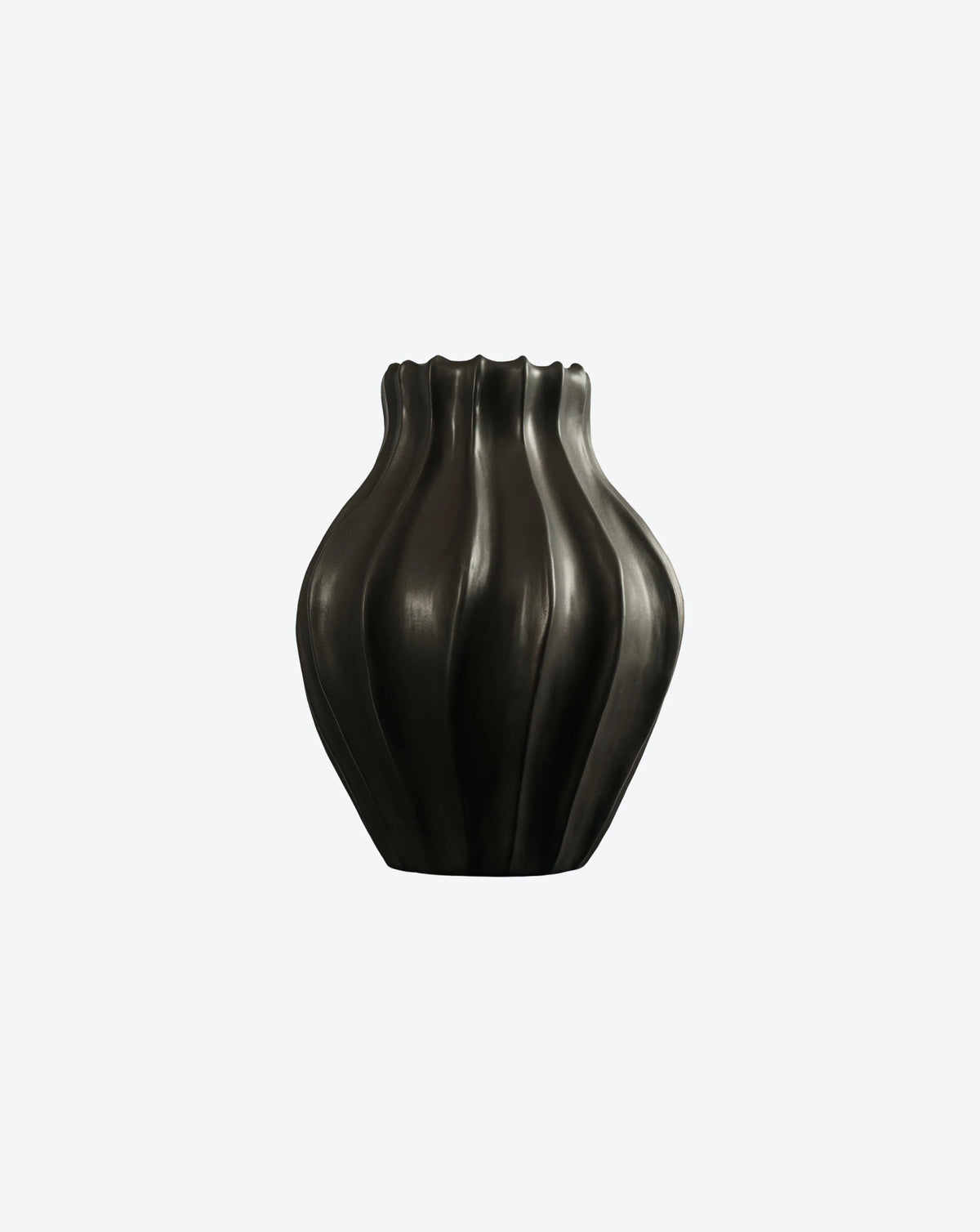 The Medium Cloak Vase by Ransom & Dunn, from our exclusive ceramic collection, showcases a dark green, wavy ribbed design with an irregular opening. Handmade in Portugal, it stands elegantly against a light gray background.