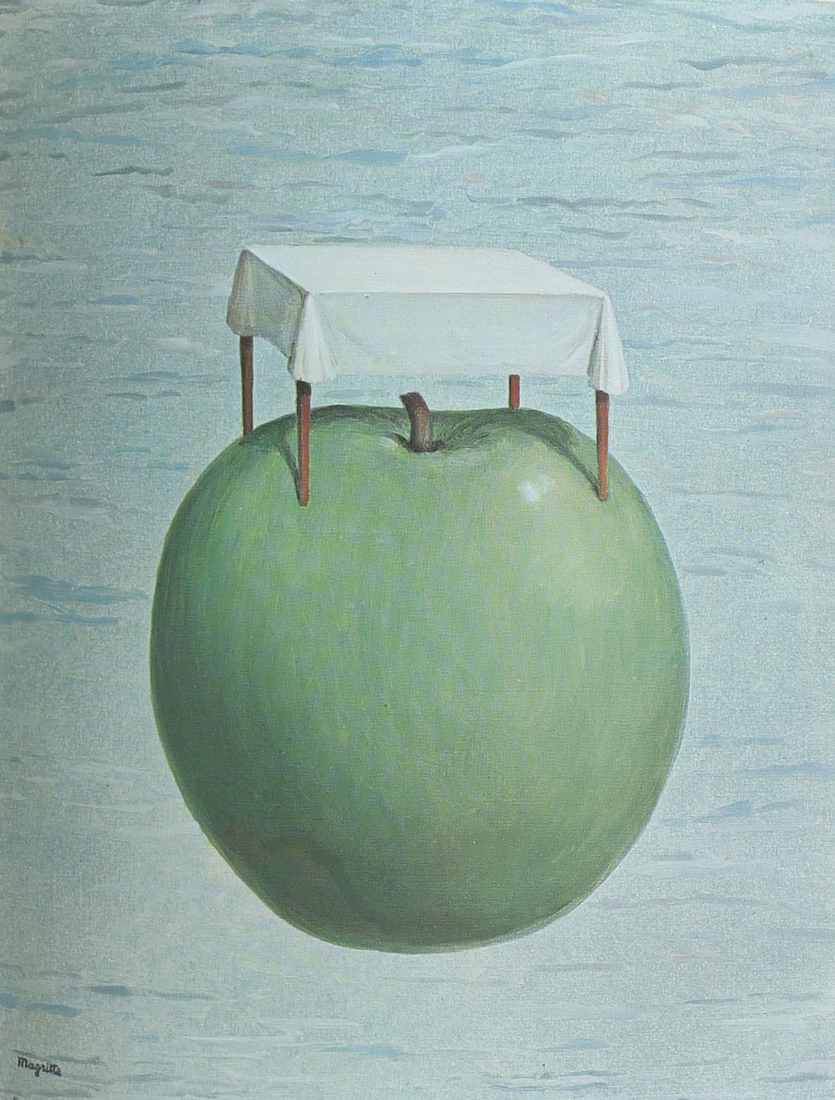 Magritte surreal art book featuring green apple with canopy illustration