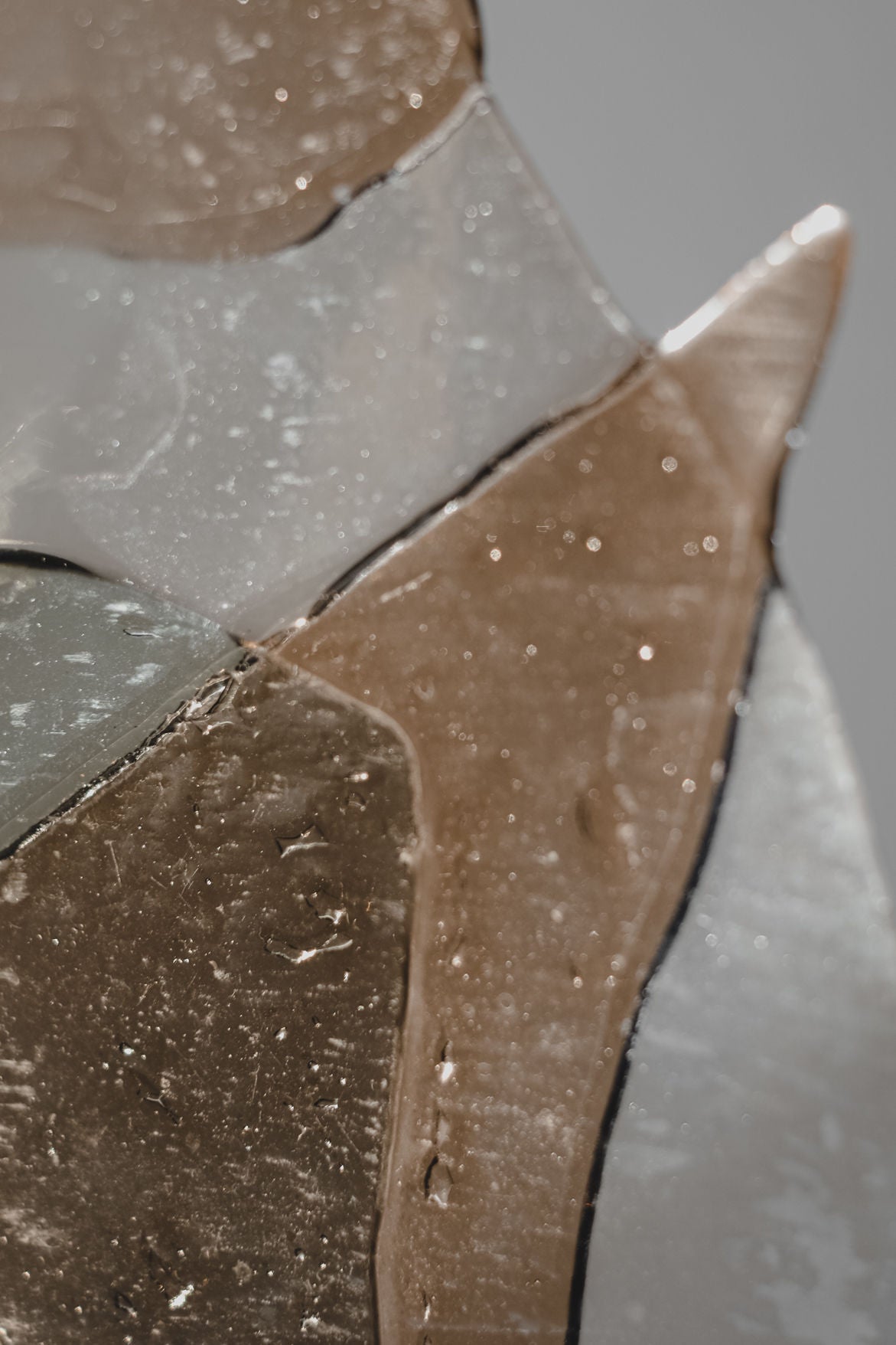 Water droplets detail on handmade glass bowl surface