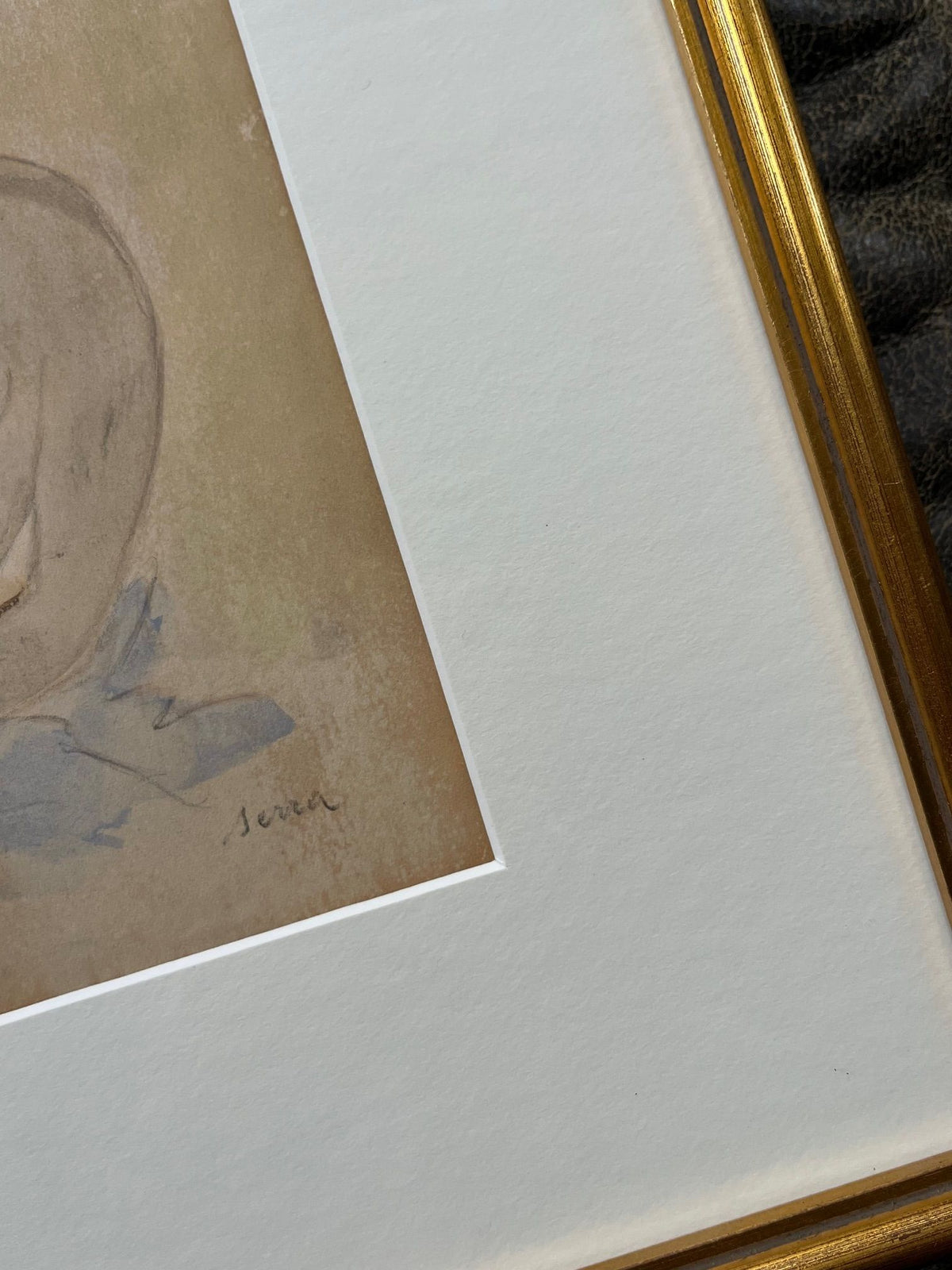 Detail of watercolor nude painting signature in ornate gold frame