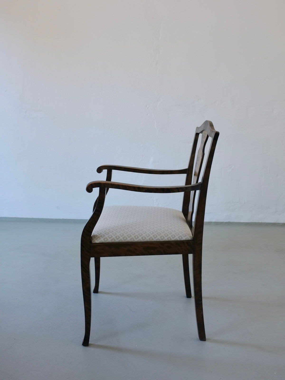 Side profile of Swedish Grace satin birch dining chair, 1920s