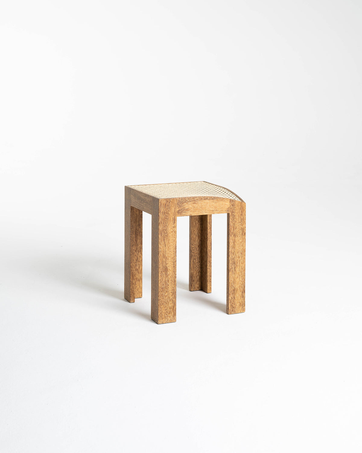 Oak Canto stool with woven cane seat and chunky legs by Andre Grippi