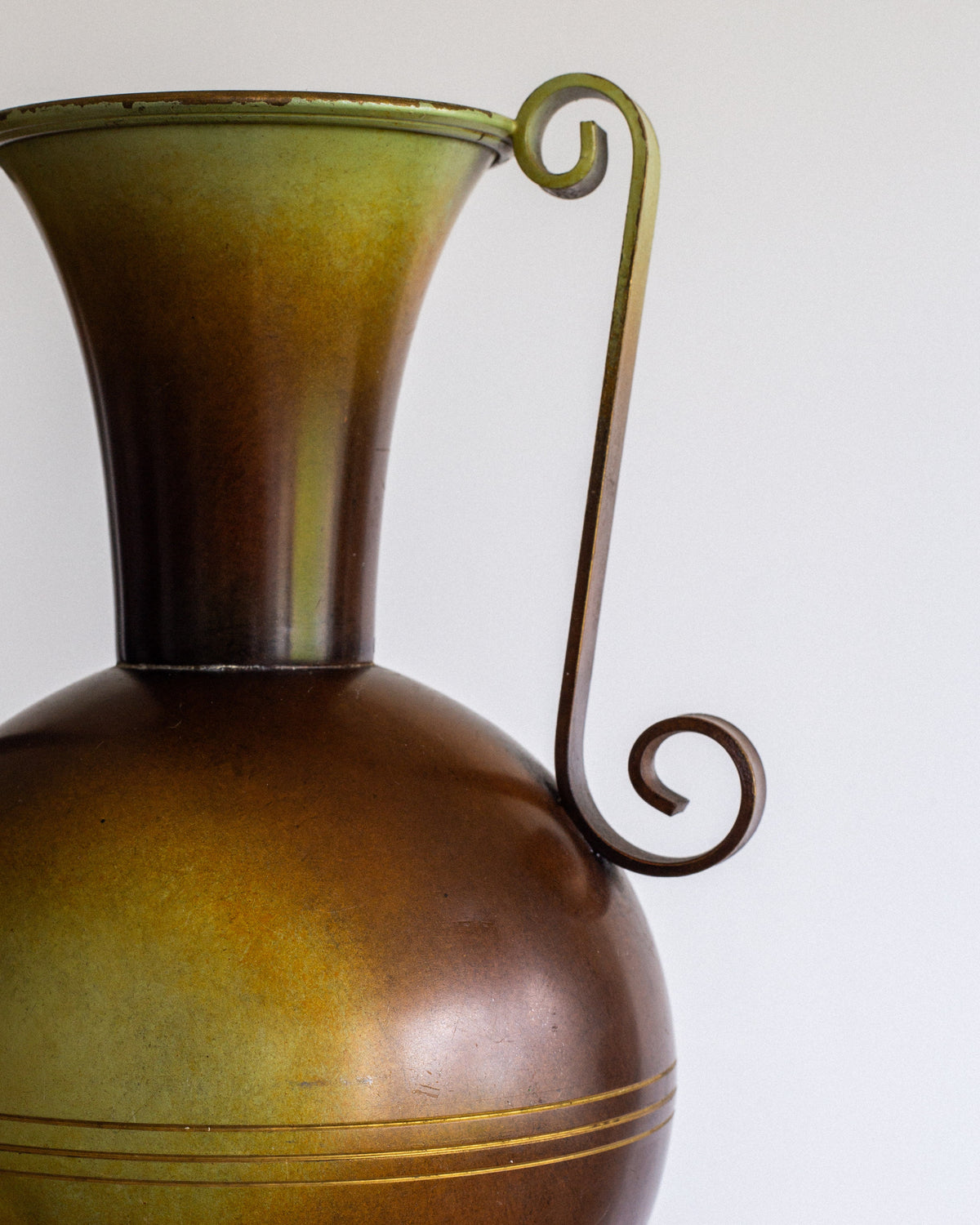 Art Deco bronze metal vase with curved handle detail, 1930s