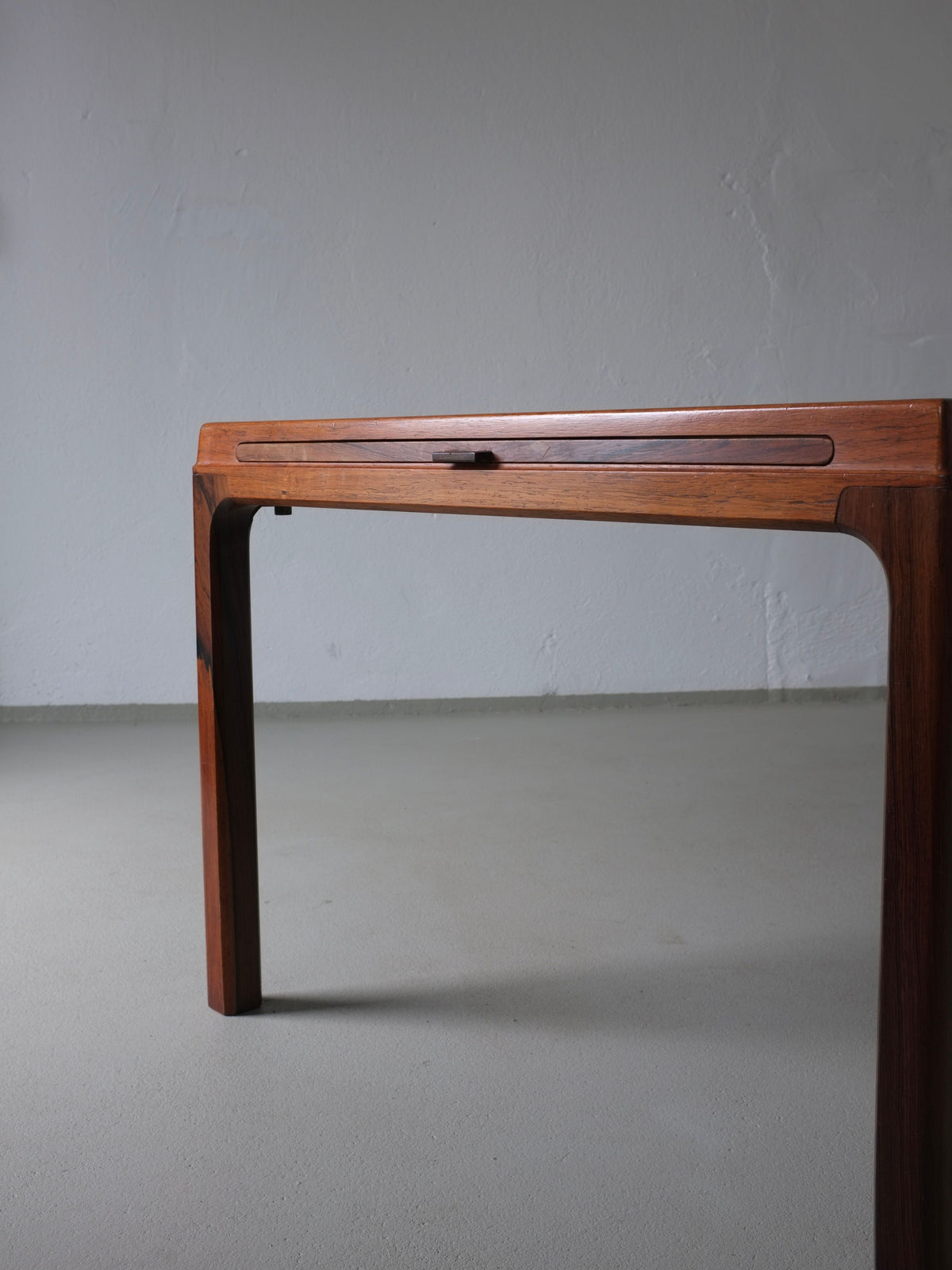 Corner detail view of Johannes Andersen rosewood coffee table