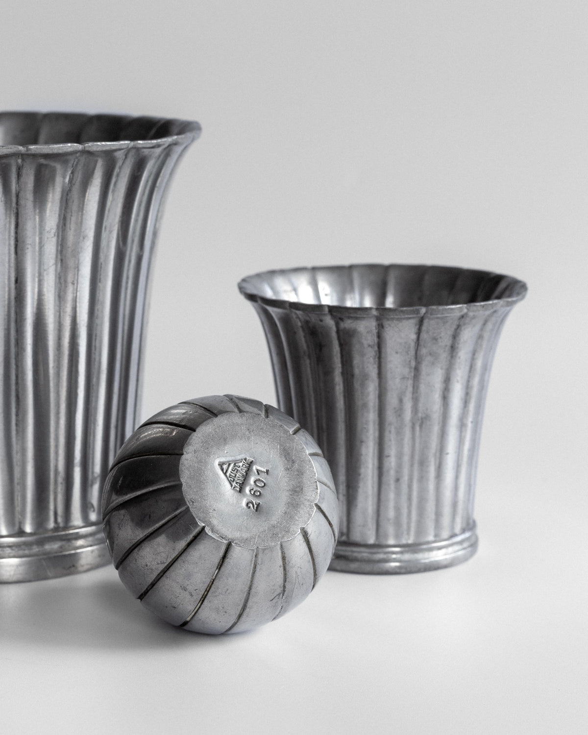 Just Andersen pewter vases with ribbed design and maker's mark detail