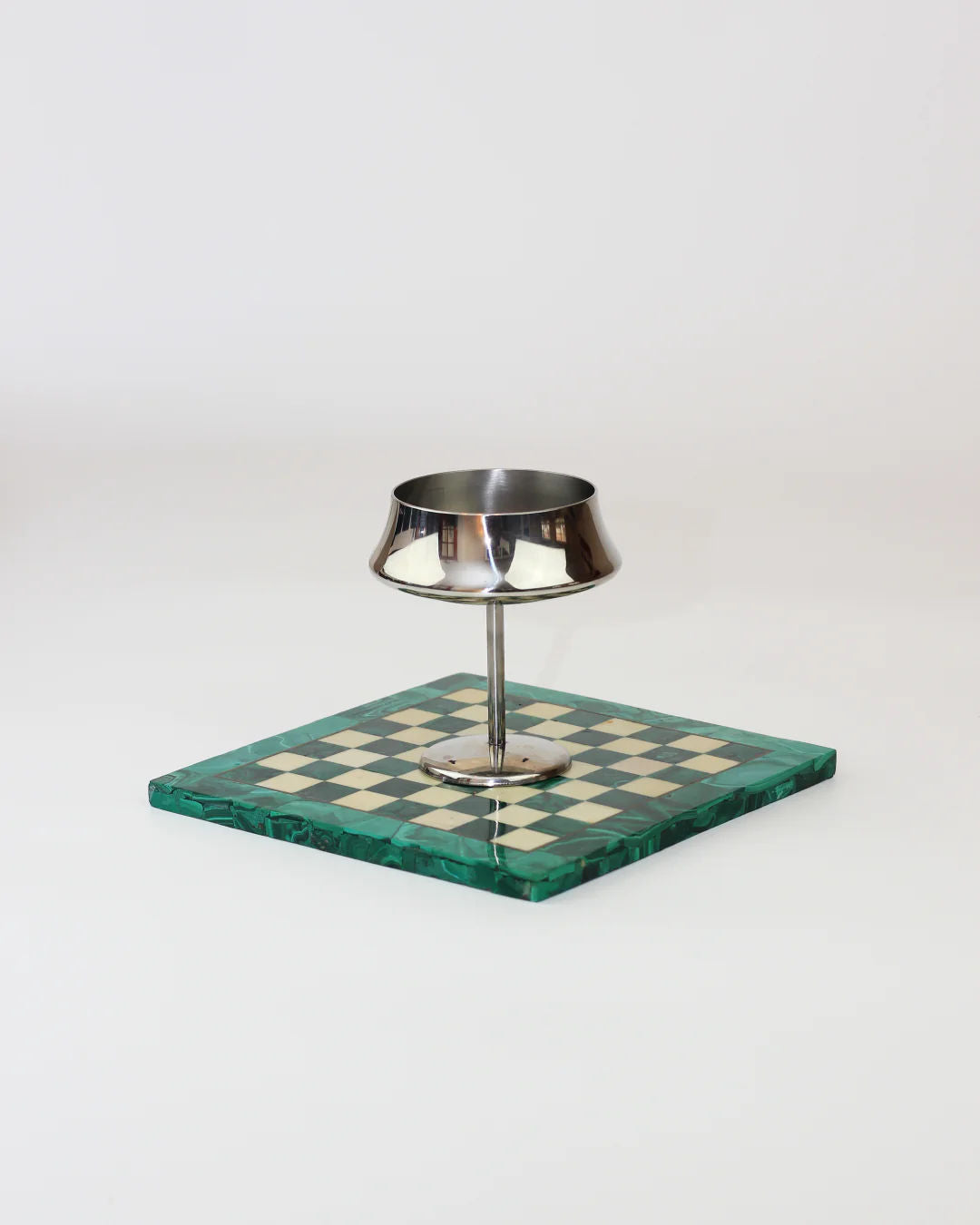 The Set of Six Stainless Steel Cups by Boga Avante Shop features modern cups with wide rims on green and white checkered bases, ideal for serving fruits or desserts, all shown against a plain white background.