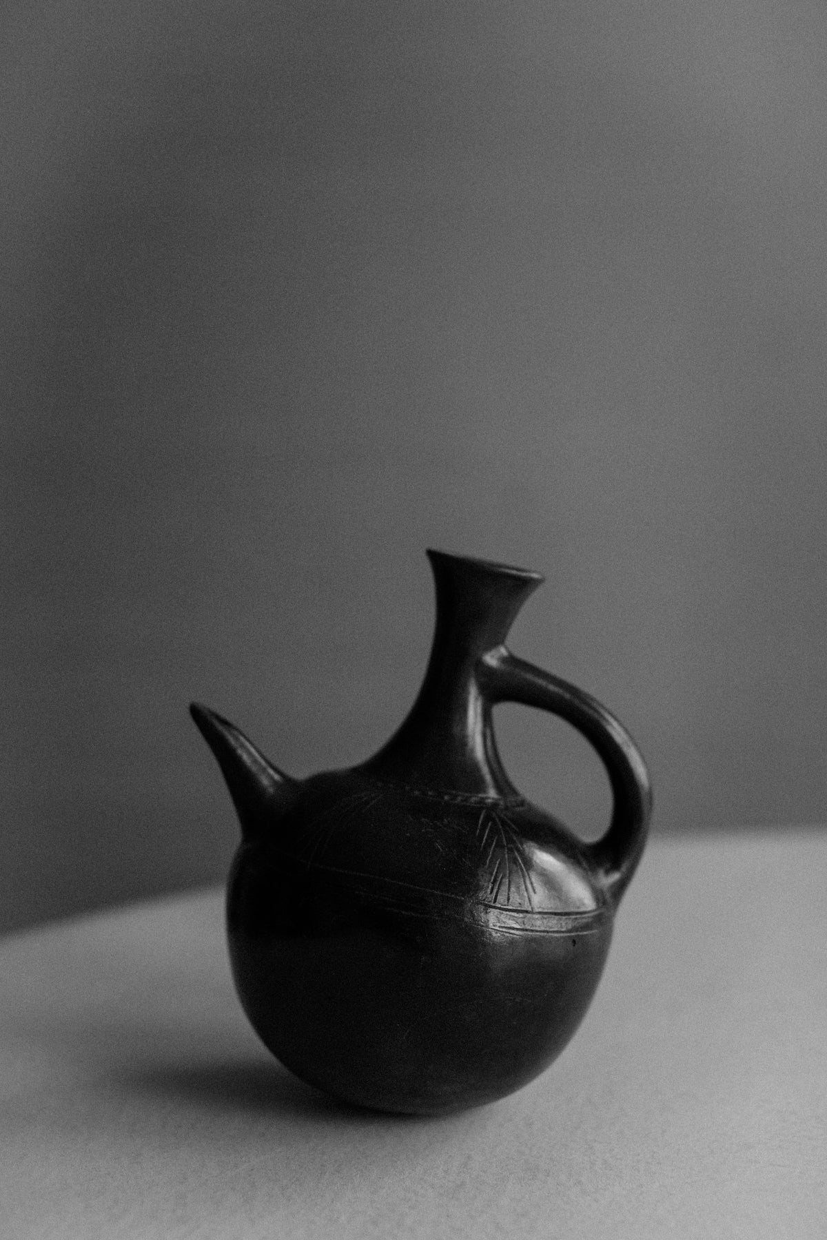 Handcrafted Ethiopian Teapot with intricate designs and traditional patterns on the surface