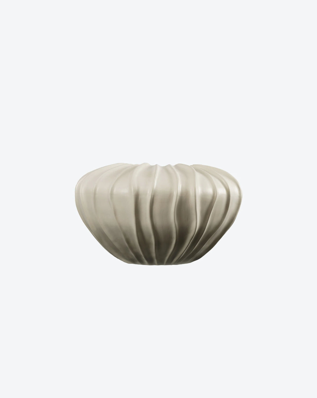Introducing the Wide Cloak Vase from Ransom & Dunn: a handcrafted piece from Portugal featuring a light gray, ribbed ceramic design. This exclusive collection's round, bulbous vase is set against a plain white background, showcasing its matte finish and vertical grooves that enhance texture and visual appeal.
