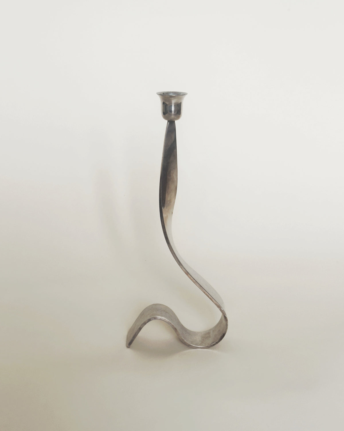 Vintage Italian silver plate ribbon candleholder with curved stem