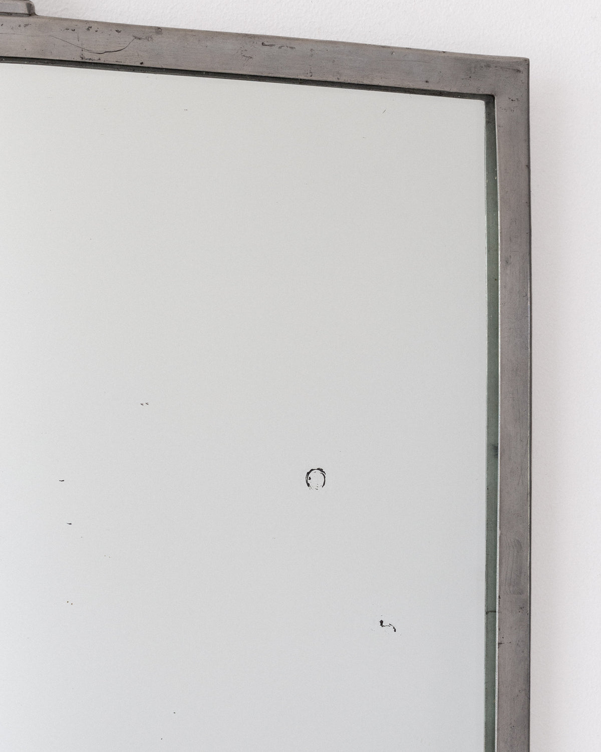 Weathered pewter frame detail of 1930s Swedish Art Deco mirror