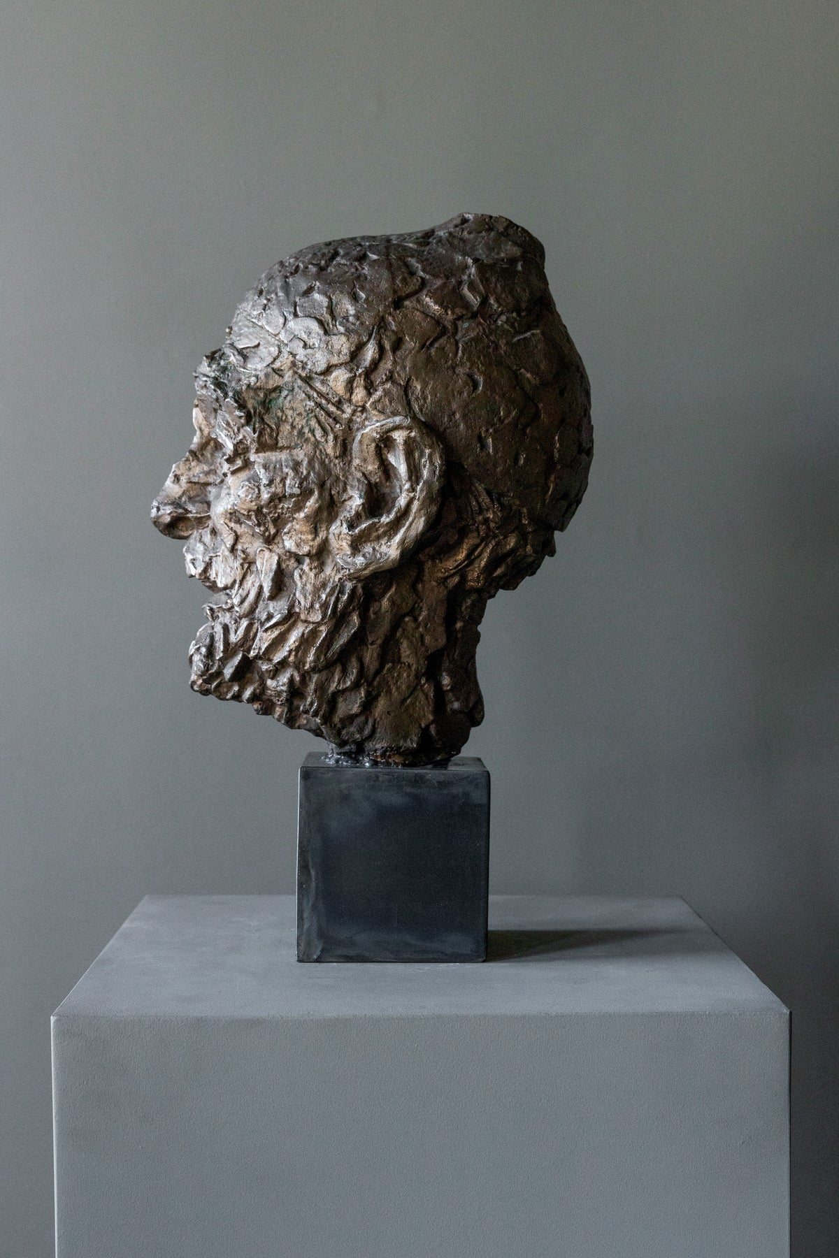 Vintage Bronze Sculpture 60s — side view highlighting textured bronze surface