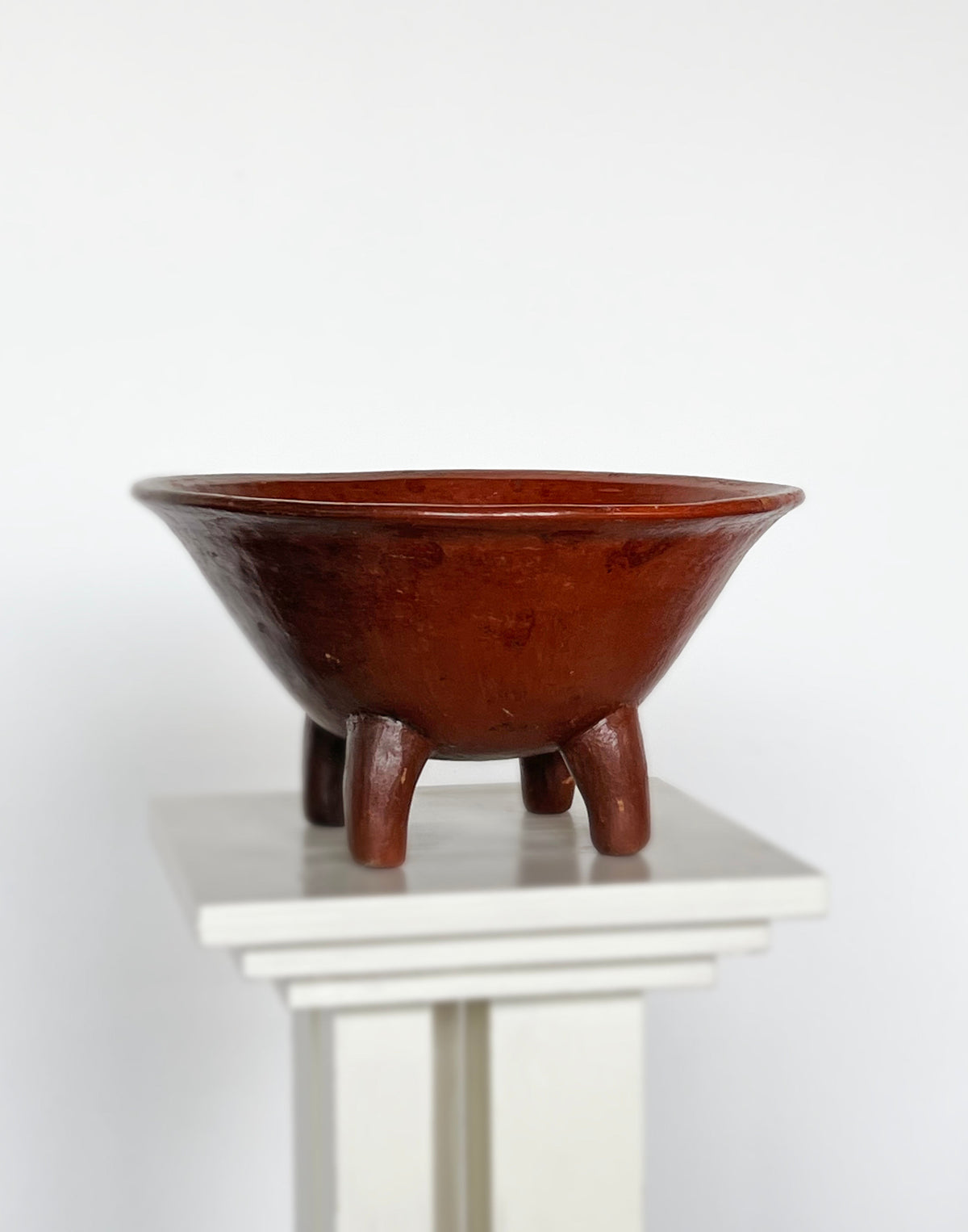 Handcrafted terracotta tripod dish with conical bowl shape