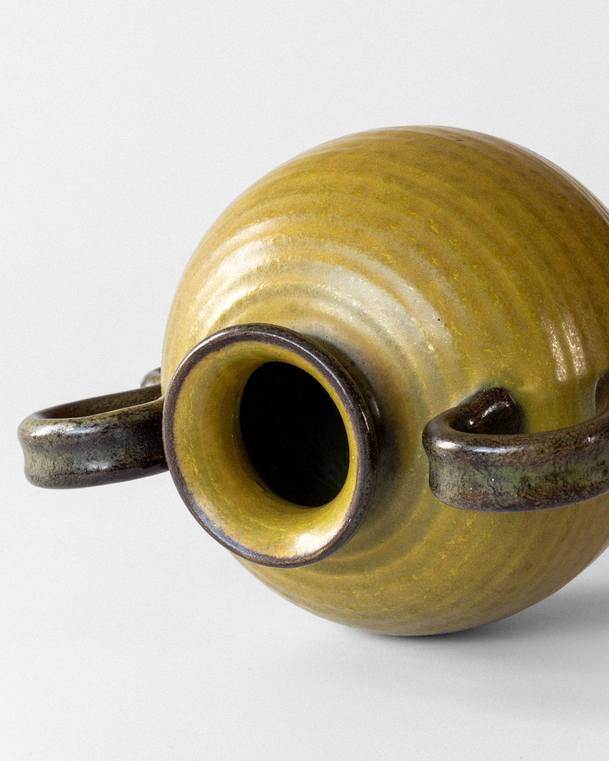 Interior view of Oliv ceramic vase showing spout opening detail