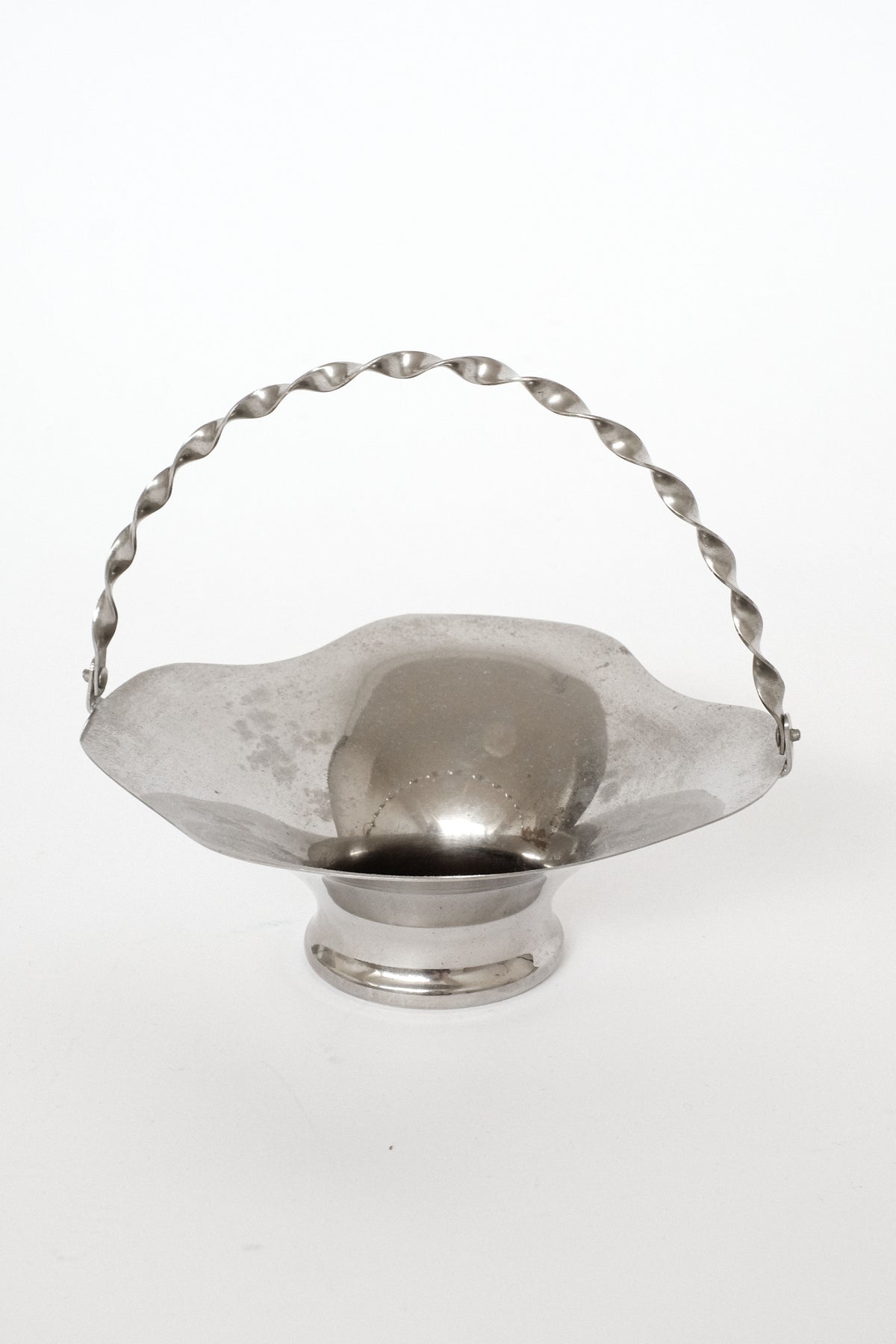 Silver twisted handle basket with footed base, decorative dish