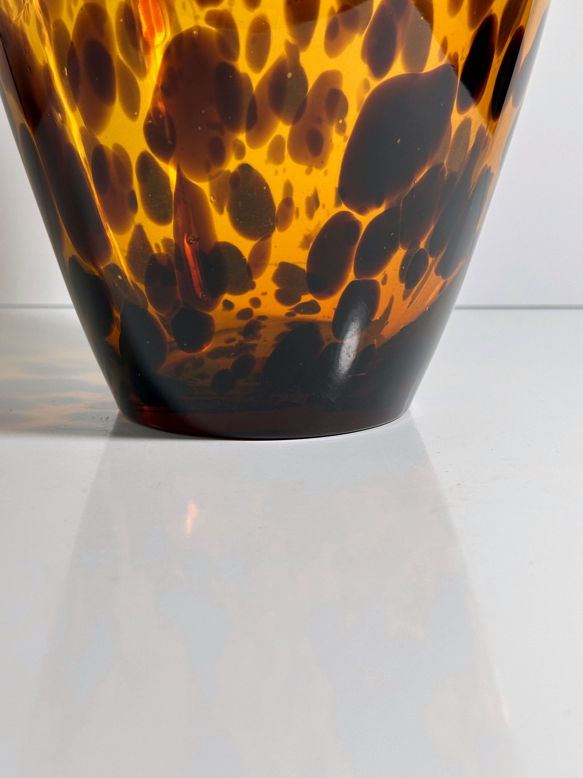 Close-up detail of tortoise-shell pattern on vintage Murano glass vase