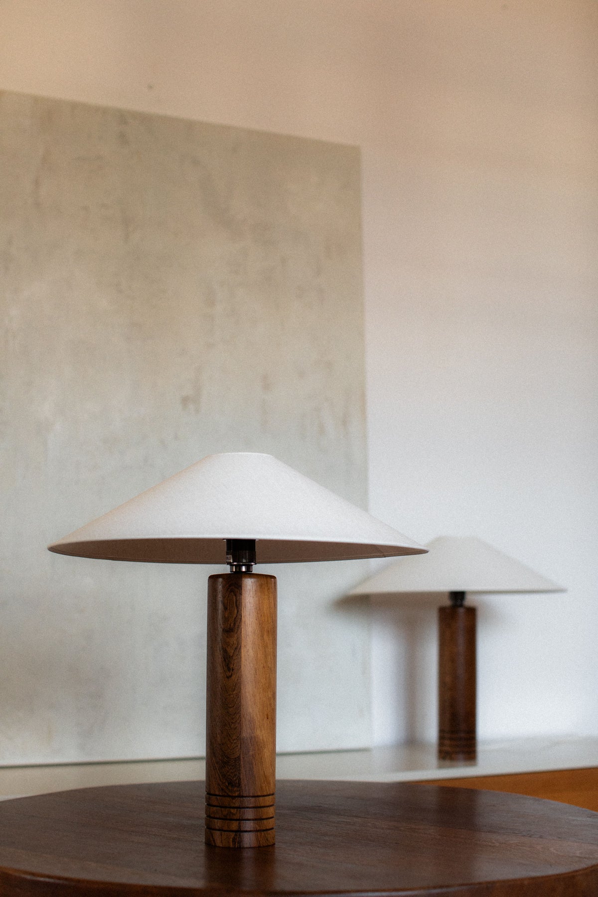 Pair of 1960s wooden table lamps with conical white shades