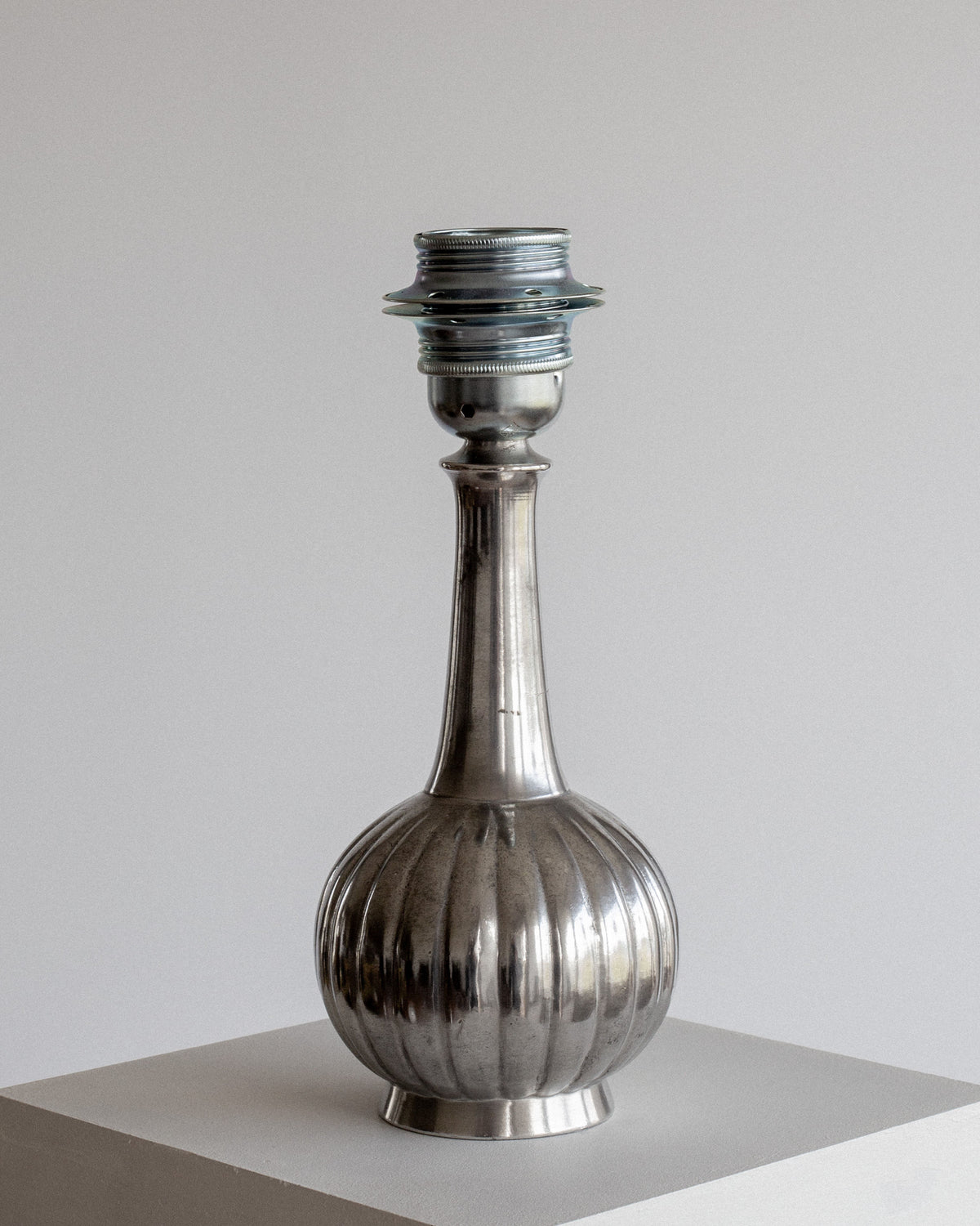 Art Deco pewter lamp base with ribbed bulbous form by Just Andersen