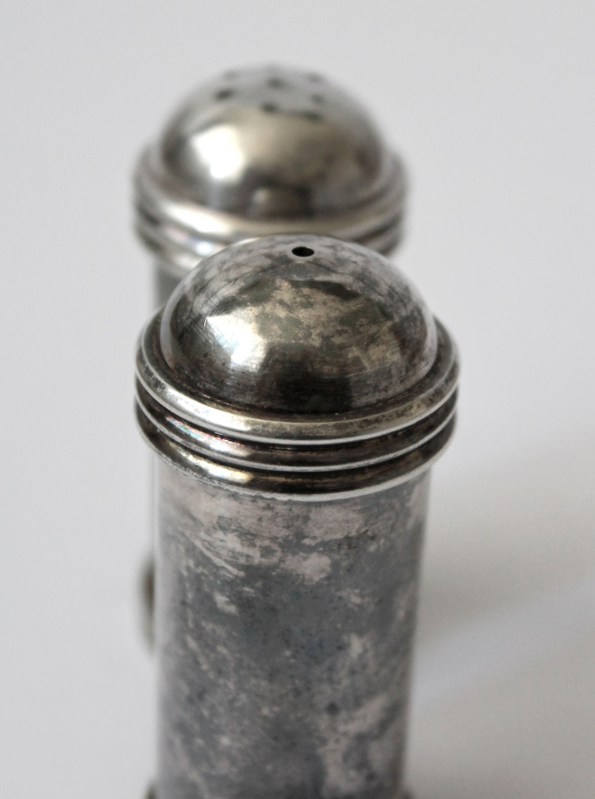 Vintage silver plated salt pepper shakers with ribbed detail