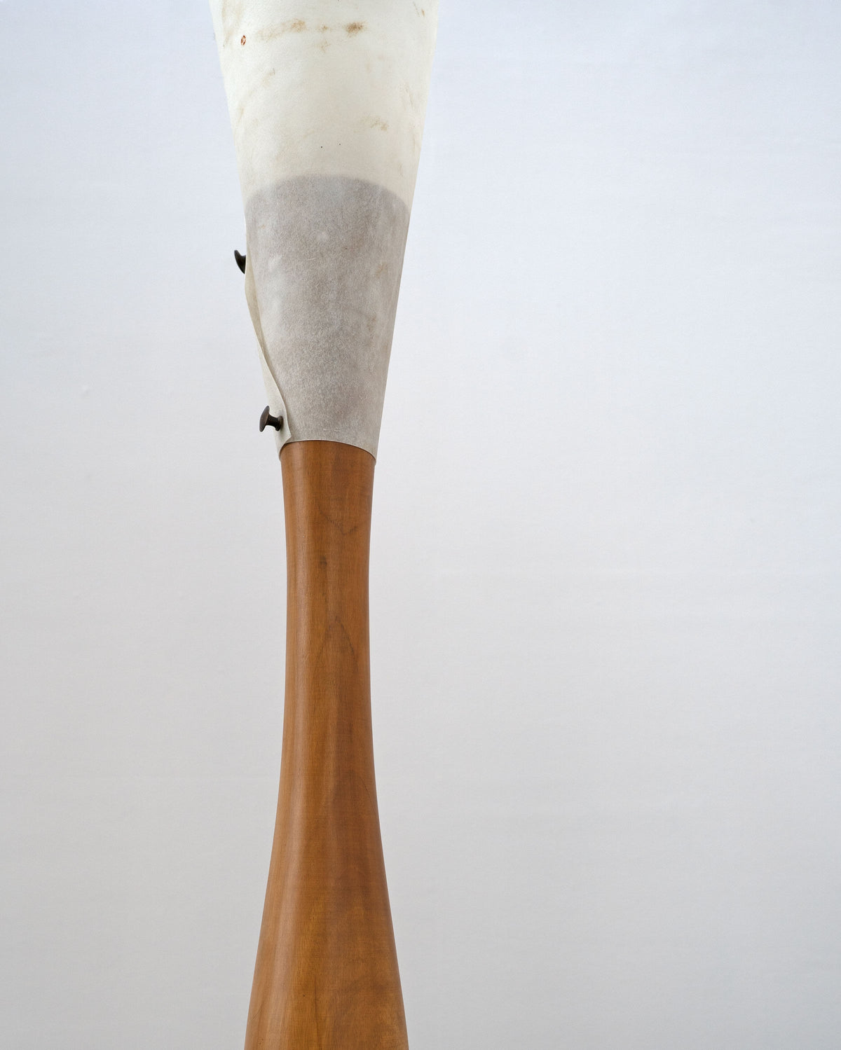 Postmodern sculptural floor lamp wood base and fabric shade detail