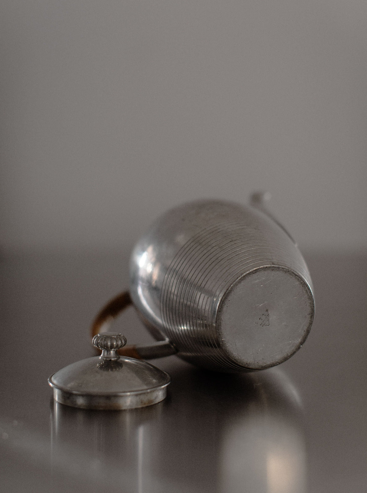 Antique Art Deco Teapot with silver accents and angular handles