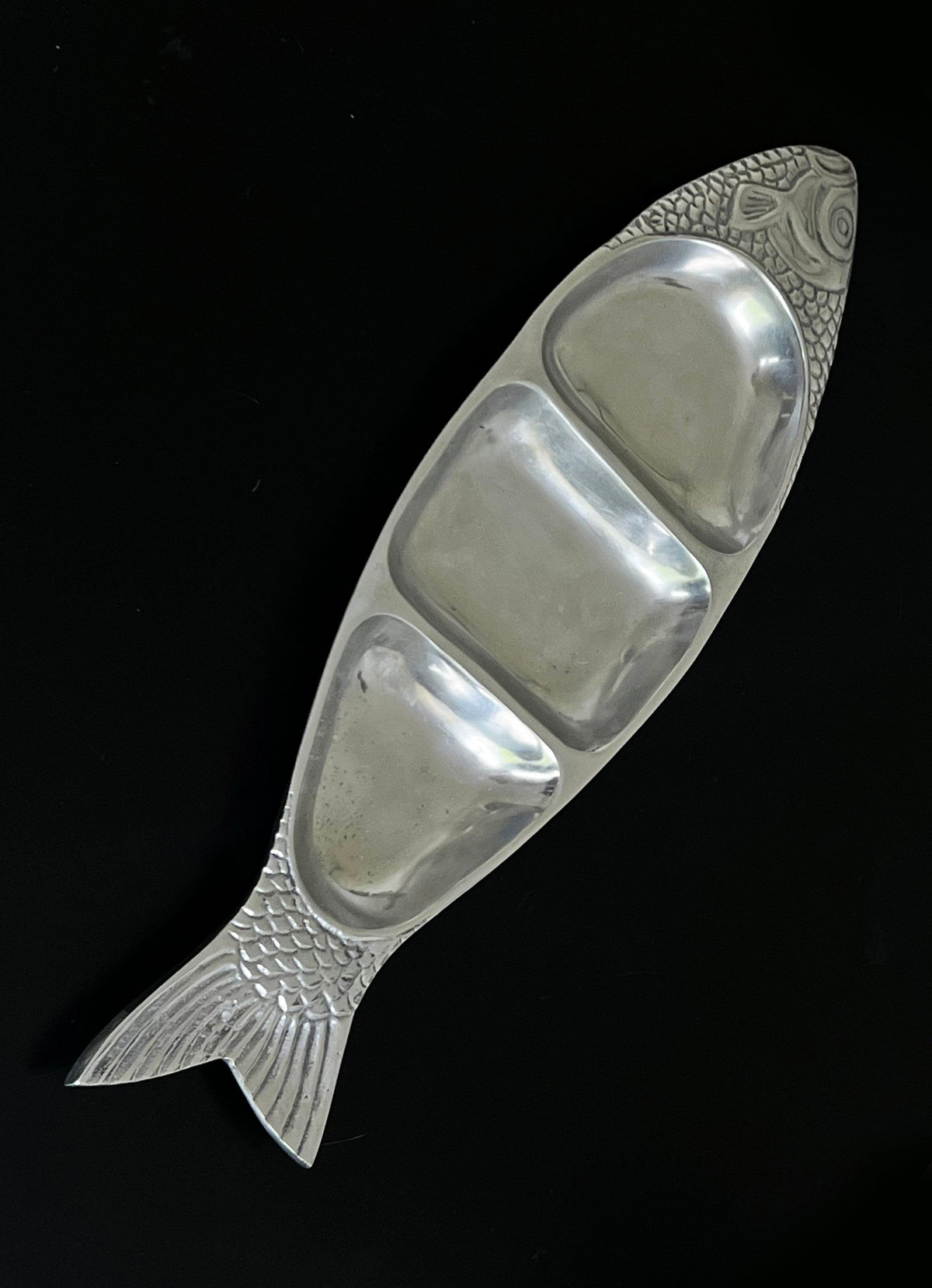 Aluminium fish-shaped serving dish with three compartments by Porter Studio