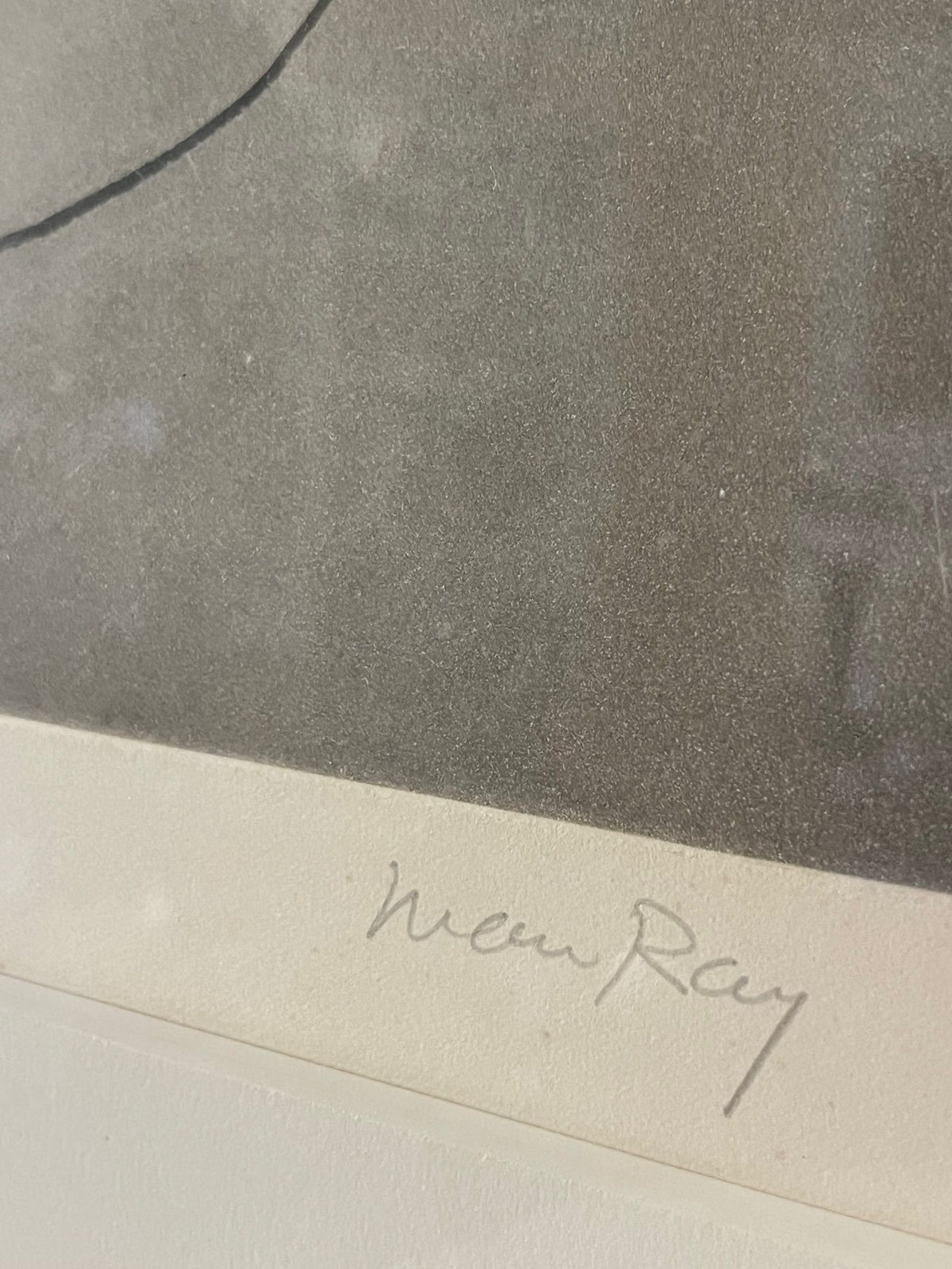 Artist signature detail on Man Ray original etching print