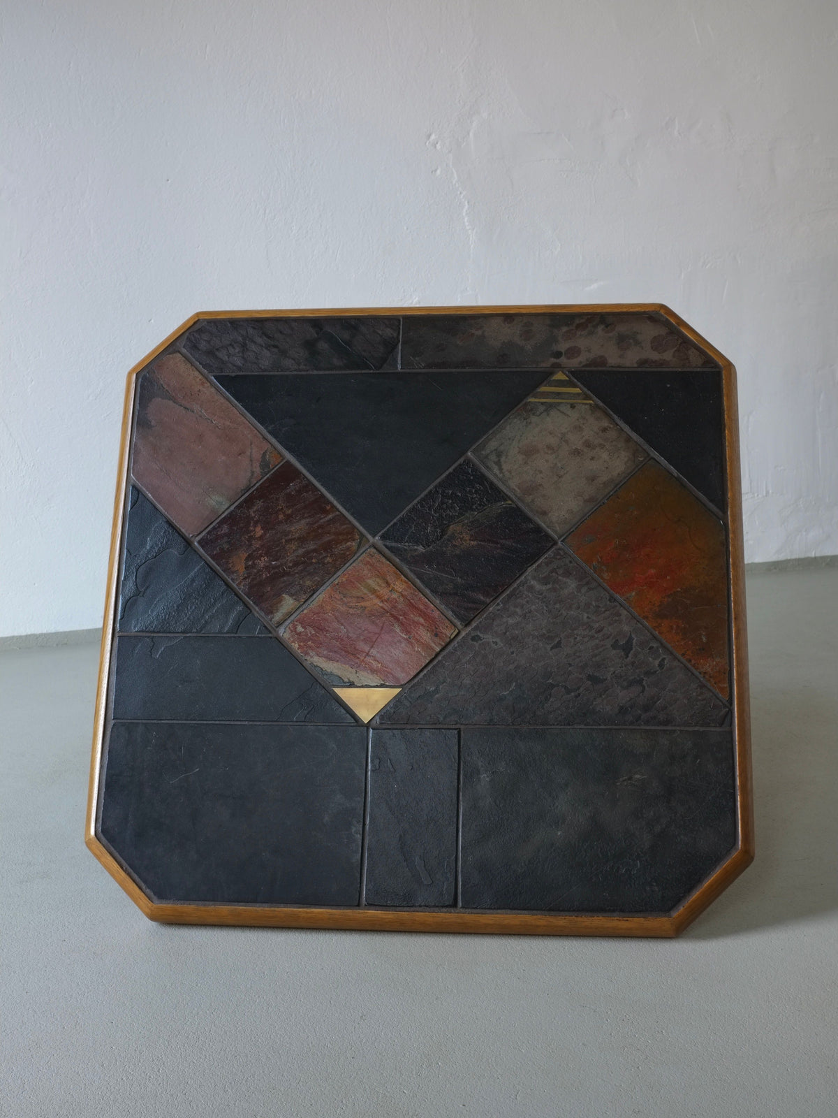 Brutalist stone inlay detail on 1970s oak square coffee table