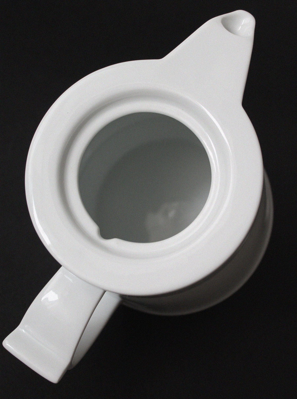 White Fürstenberg porcelain teapot viewed from above showing spout