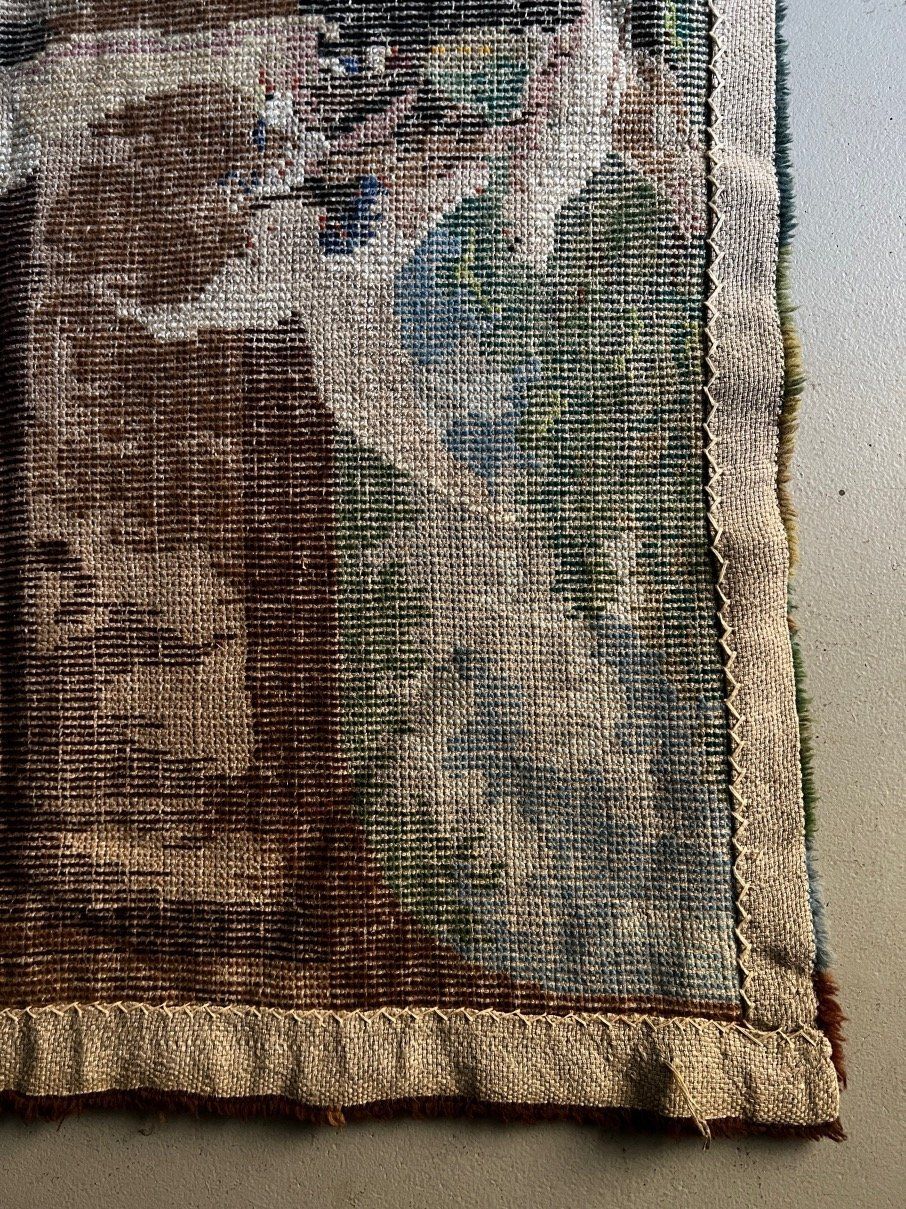 Corner detail showing woven texture and serged edge of Swedish wool wall hanging