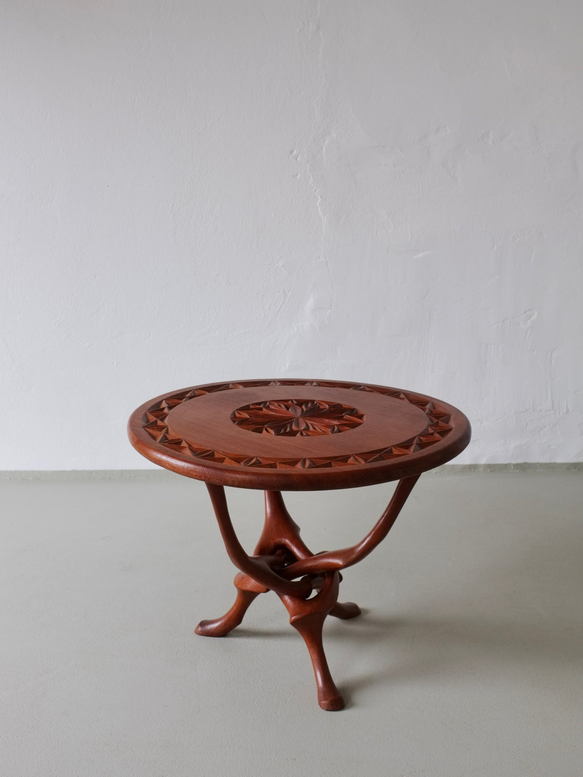 Sculptural teak side table with carved geometric pattern, 1960s