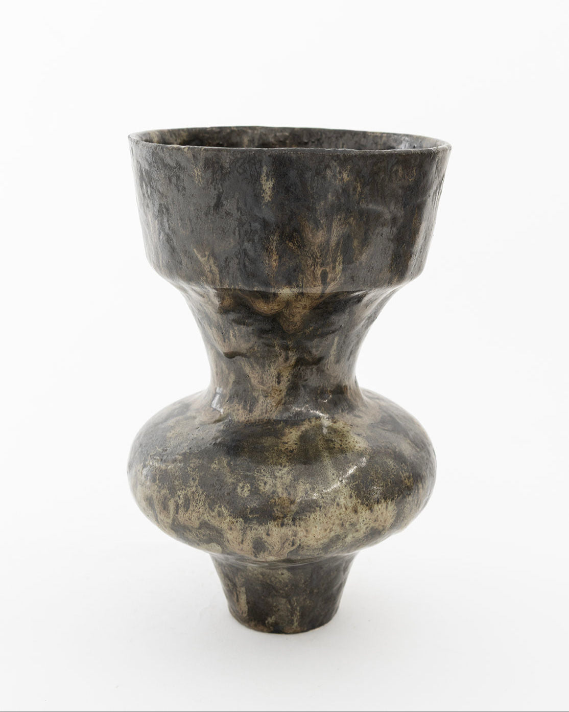 Dark marbled stone vase with distinctive hourglass silhouette
