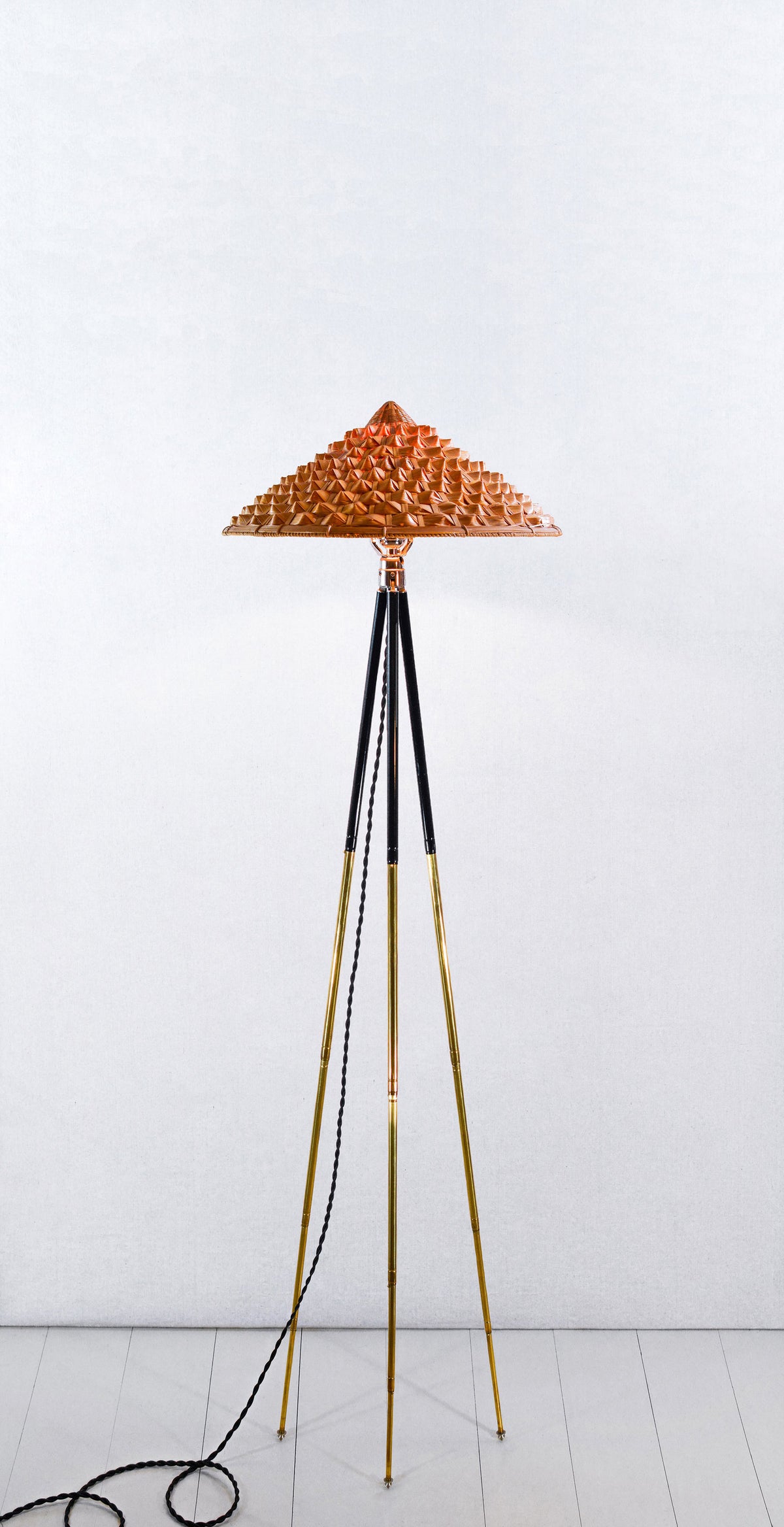 Horst tripod floor lamp with textured copper shade on brass legs