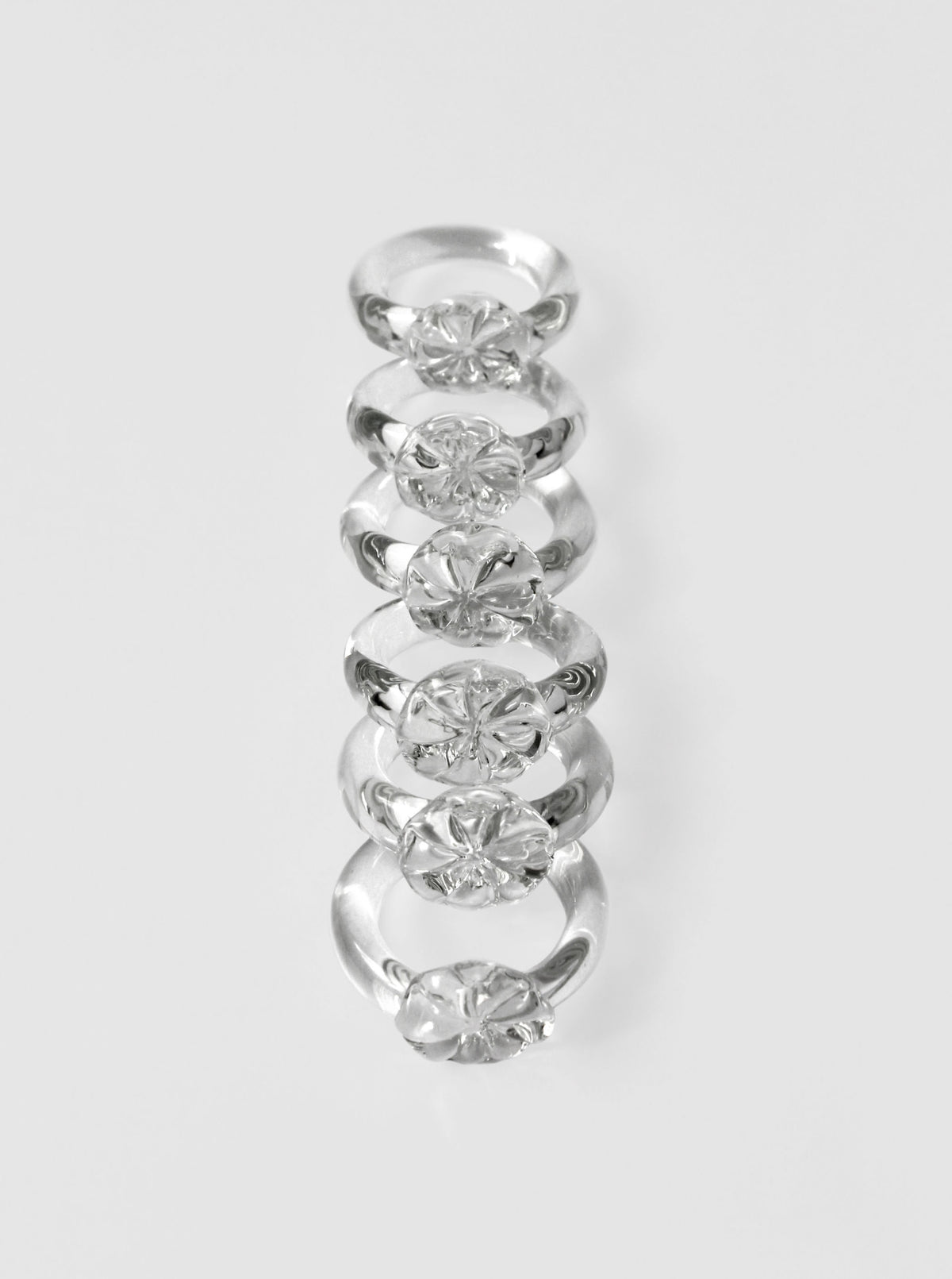 Stacked vintage glass napkin rings with crystal cut diamonds