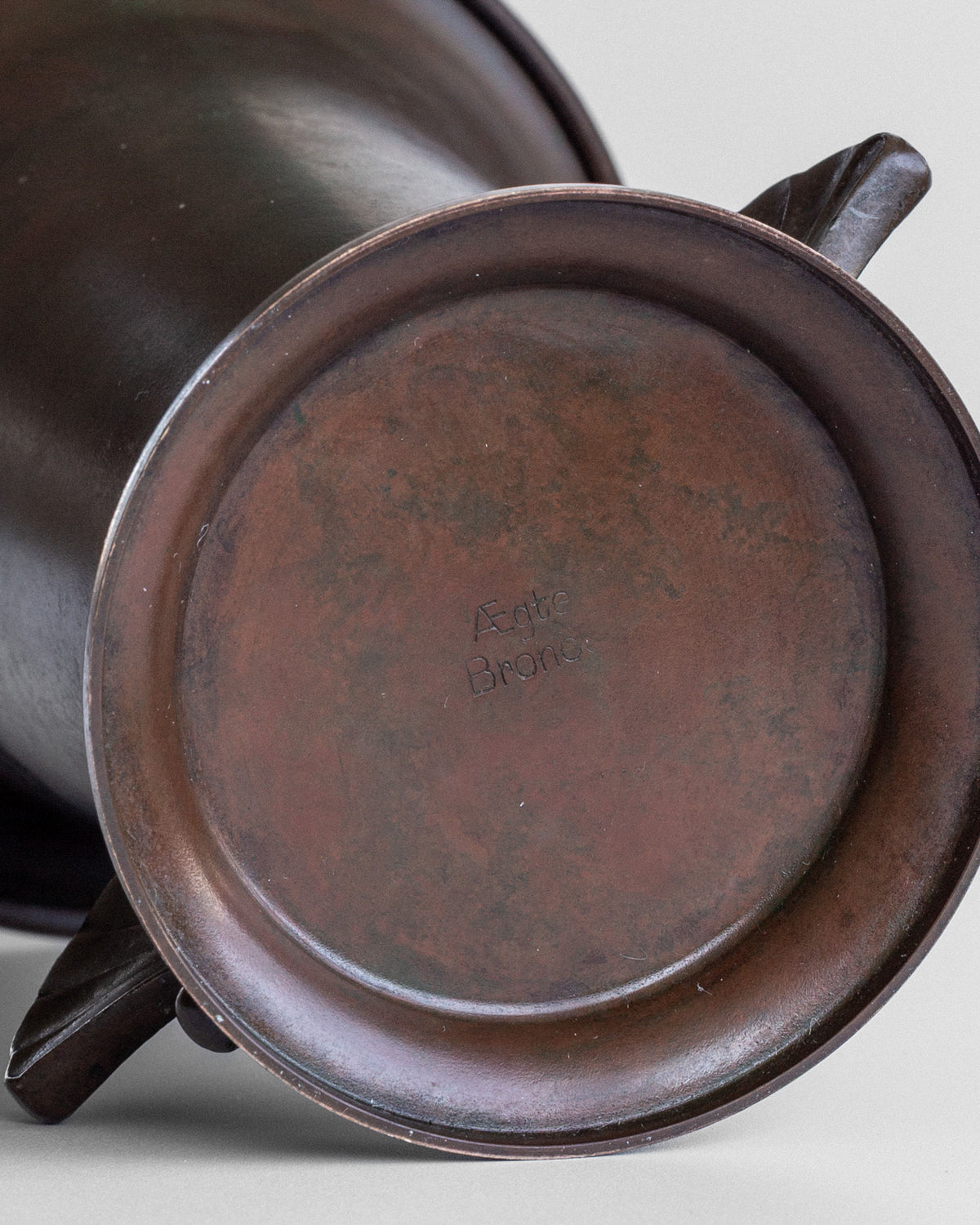 Bottom view showing maker's mark on Danish Art Deco bronze vase