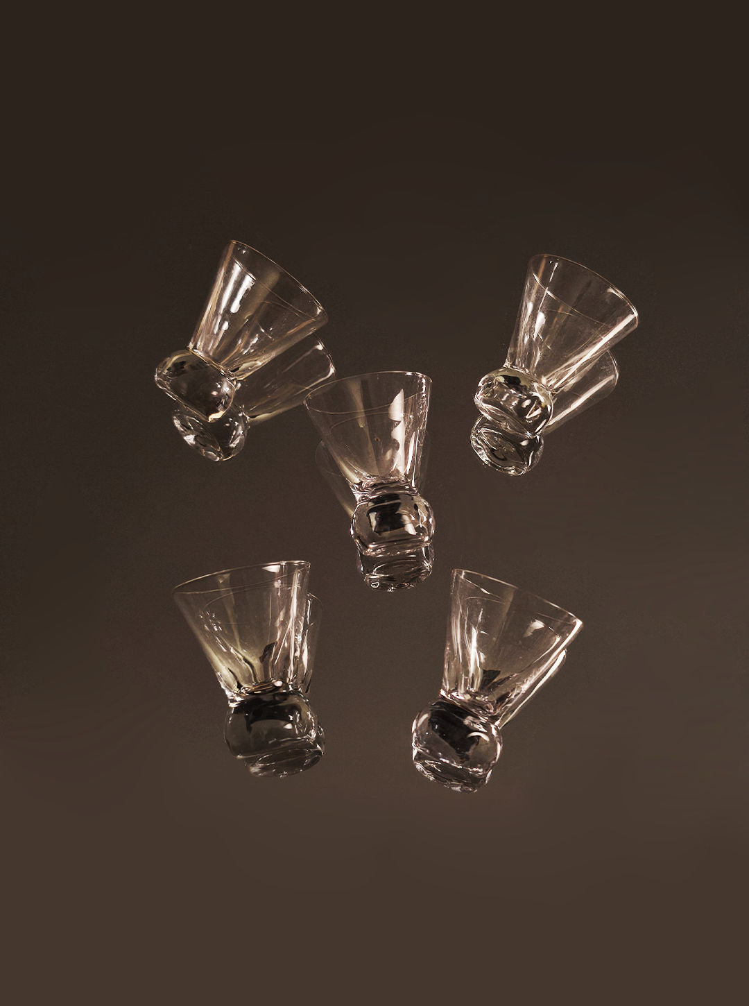 Set of 5 crystal shot glasses with twisted sculptural stems