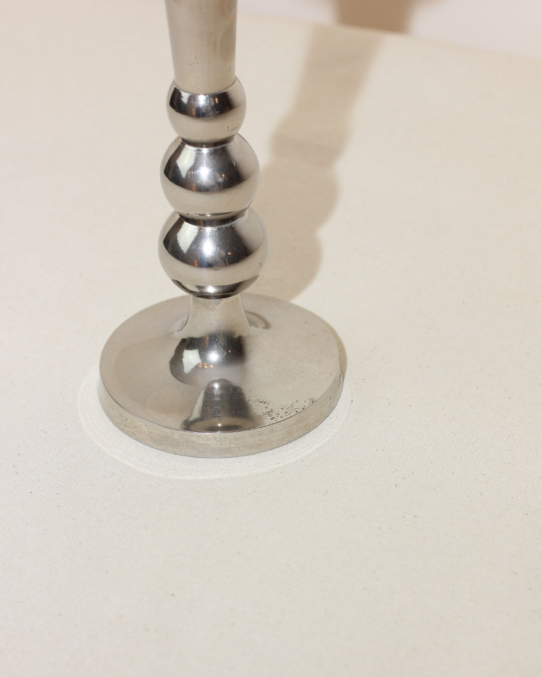 Close-up base detail of Acero stainless steel candleholder