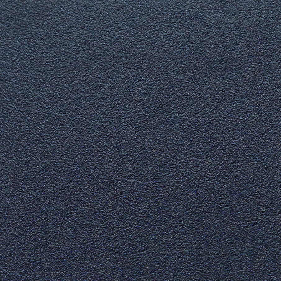Dark blue textured fabric detail of Double Jeu coffee table