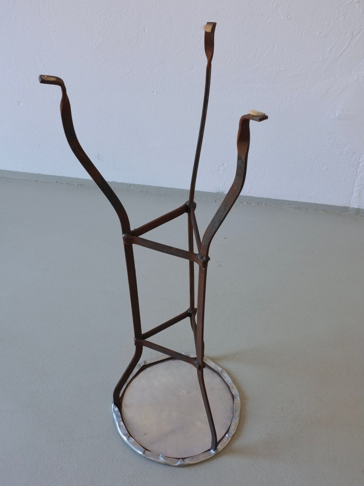 Vintage iron side table frame without top, curved legs detail